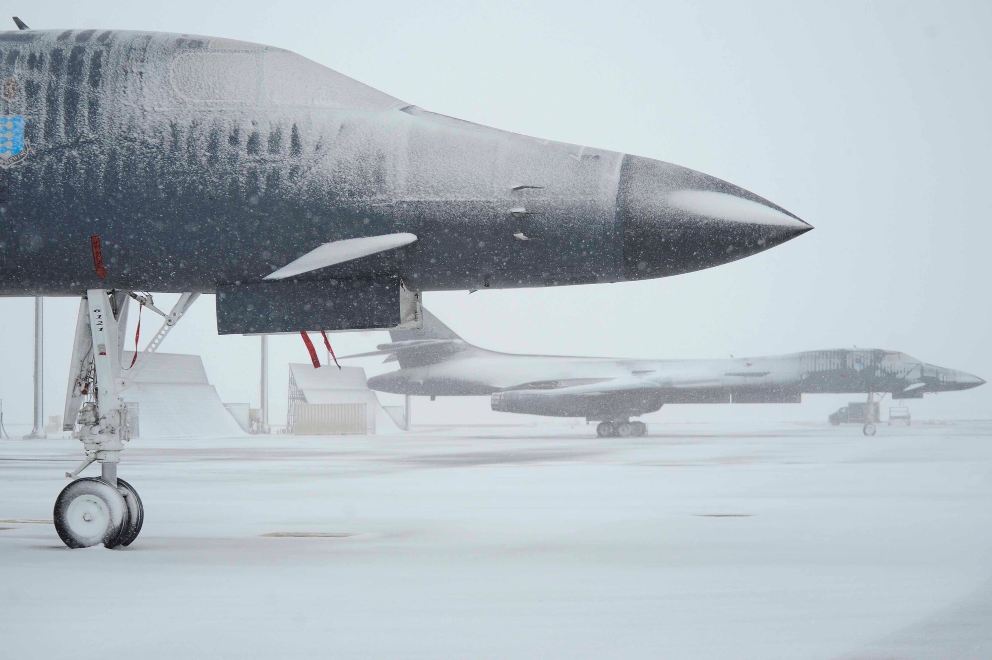 ELLSWORTH AIR FORCE BASE, S.D.--Ellsworth's first big snowfall of the winter season collects on B-1B Lancers here, Oct. 29. The B-1 is a supersonic component of the Air Force's long-range bomber force. (U.S. Air Force photo/Airman 1st Class Corey Hook)