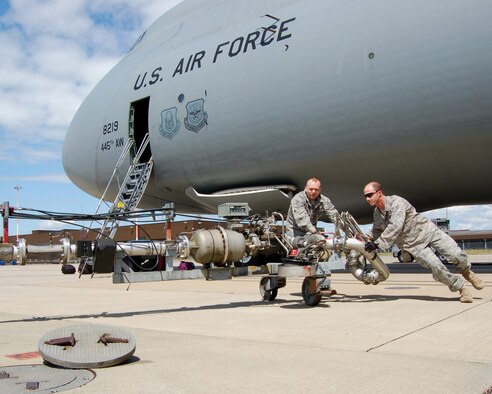 WRIGHT-PATTERSON AIR FORCE BASE, Ohio – Staff Sgts. Michael Nowicke and Shawn McKellop, 445th Logistics Readiness Squadron, prepare a pantograph for refueling C5 Galaxy aircraft at RAF Mildenhall , United Kingdom. Approximately 60 individuals from the 445 LRS performed their annual training at Mildenhall July 11-25. (U. S. Air Force photo/Maj. Jose A. Cardenas)