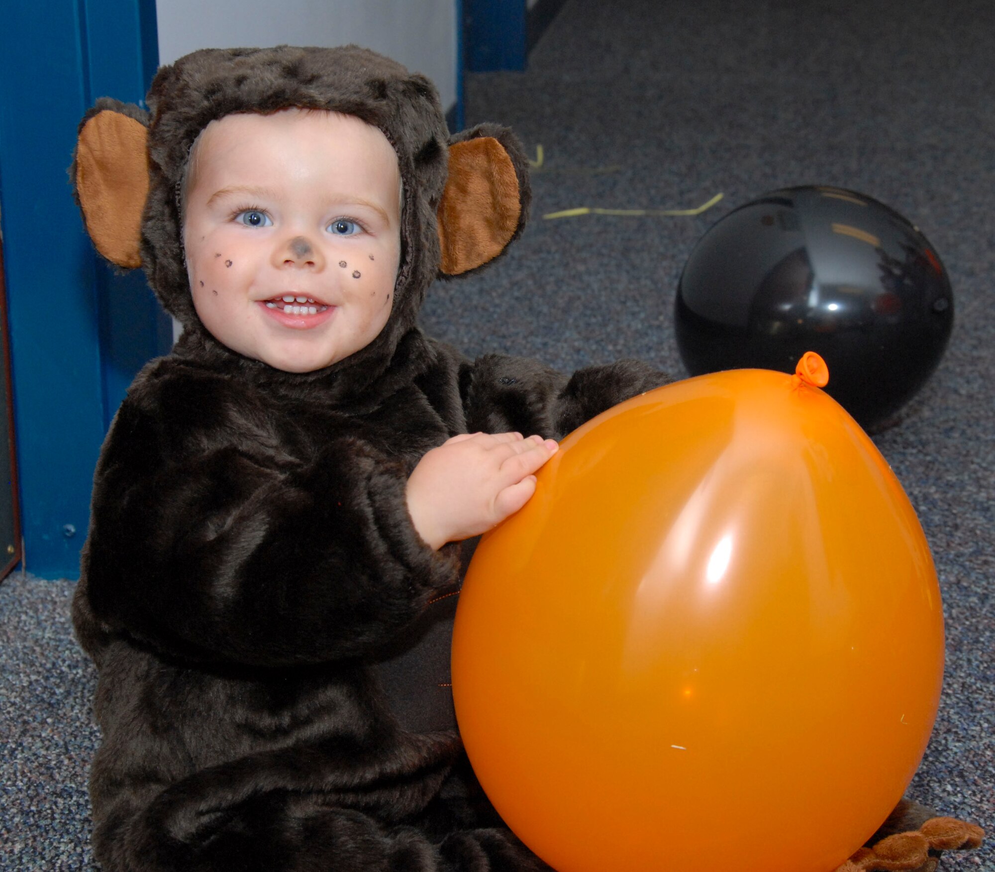 Michael Valeriano displays his Halloween costume at the Air Command and Staff College Fall Festival. Held annually, this year’s festival included pumpkin-carving contests, games, a magic show and arts and crafts.Seminar rooms were decorated appropriately and competed in categories that included terrifying, friendly, scary and spooky. (U.S. Air Force photo/Jamie Pitcher)