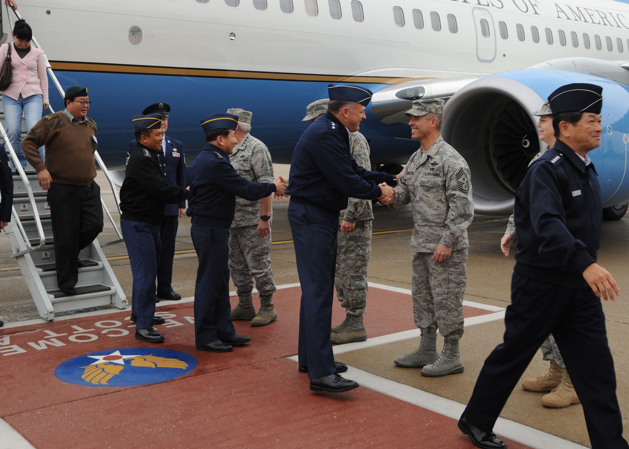 Gen. Gary North, Pacific Air Forces commander, along with Pacific Air Chiefs, greets AMC leadership upon arrival to Scott Air Force Base Oct. 28.  Nine Pacific Air Chiefs visited Air Mobility Command as part of a multi-stop tour consisting of several U.S. Air Force installations in an effort to continue to develop and enhance the relationship between the U.S. and other air forces. (U.S. Air Force photo/A1C Tristin English)