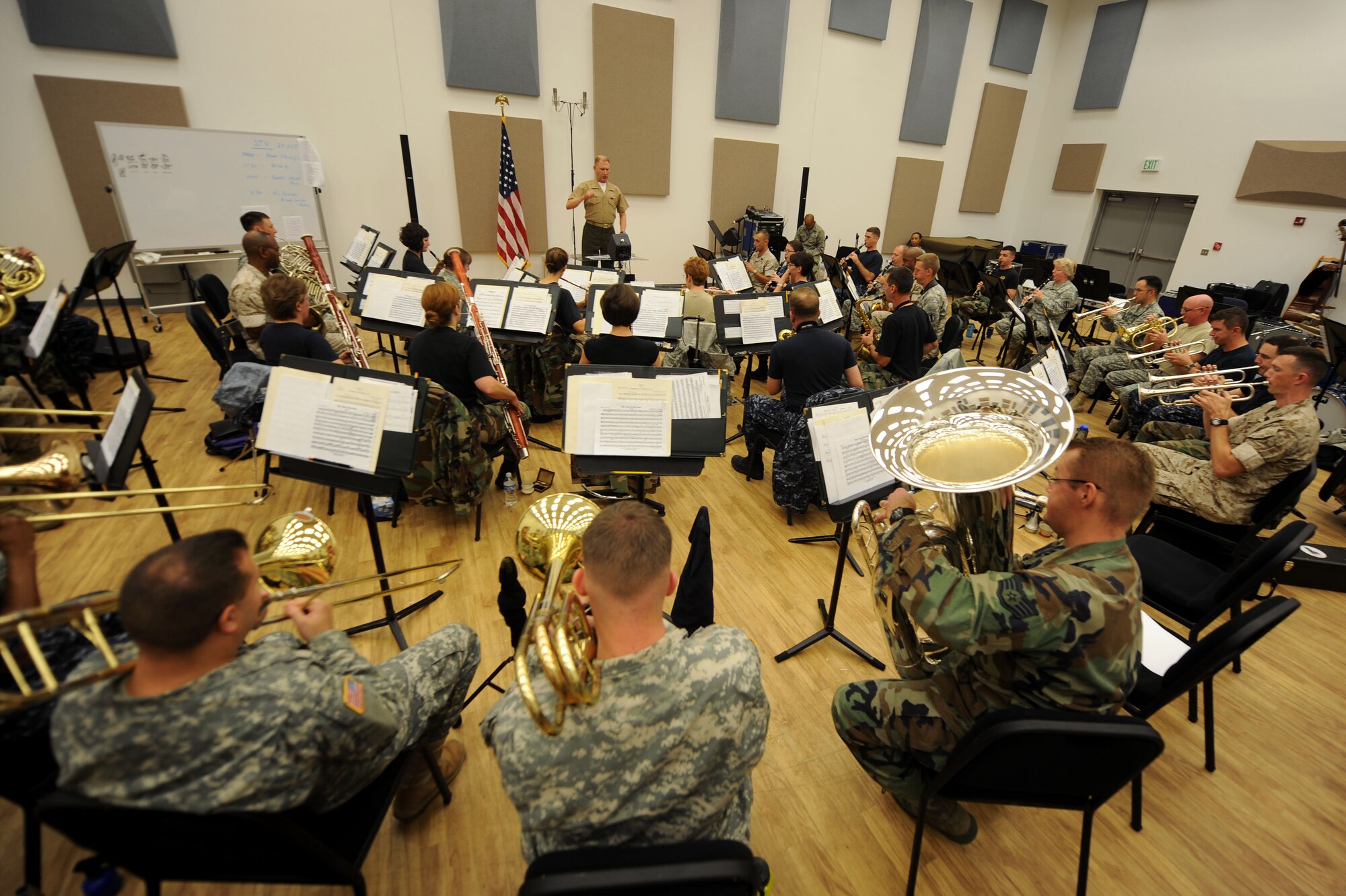 LANGLEY AIR FORCE BASE, Va. – A combined forces military band rehearses here Oct. 29 in preparation for the 14th Annual "Salute to Veterans" concert, hosted by U.S. Joint Forces Command.  The concert is scheduled for Friday, Nov. 6, at the Chrysler Hall in Norfolk and is free and open to the public.  (U.S. Air Force photo/Airman Rebecca Montez)