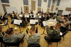 LANGLEY AIR FORCE BASE, Va. – A combined forces military band rehearses here Oct. 29 in preparation for the 14th Annual "Salute to Veterans" concert, hosted by U.S. Joint Forces Command.  The concert is scheduled for Friday, Nov. 6, at the Chrysler Hall in Norfolk and is free and open to the public.  (U.S. Air Force photo/Airman Rebecca Montez)