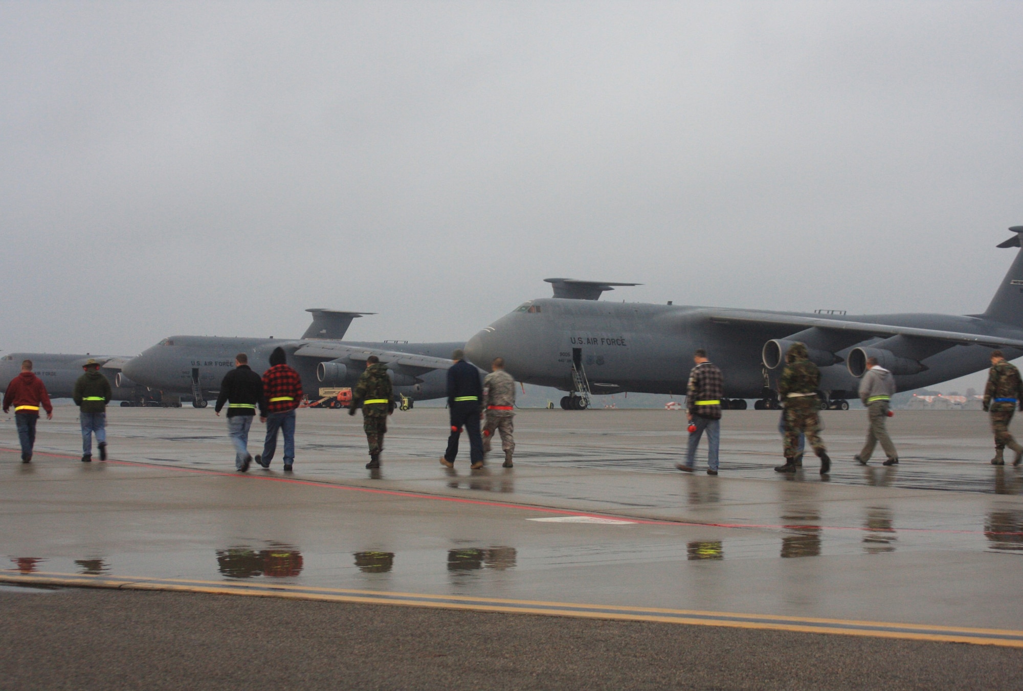WRIGHT-PATTERSON AIR FORCE BASE, Ohio – More than 130 reservists and civilians from the 445th Airlift Wing participated in the bi-monthly foreign object debris (FOD) walk Oct. 28.  FOD on the flightline could be ingested and severely damage aircraft engines.  More than four pounds of FOD was collected, which equates to several thousand small stones.  (U. S. Air Force photo/Senior Airman Mikhail Berlin)