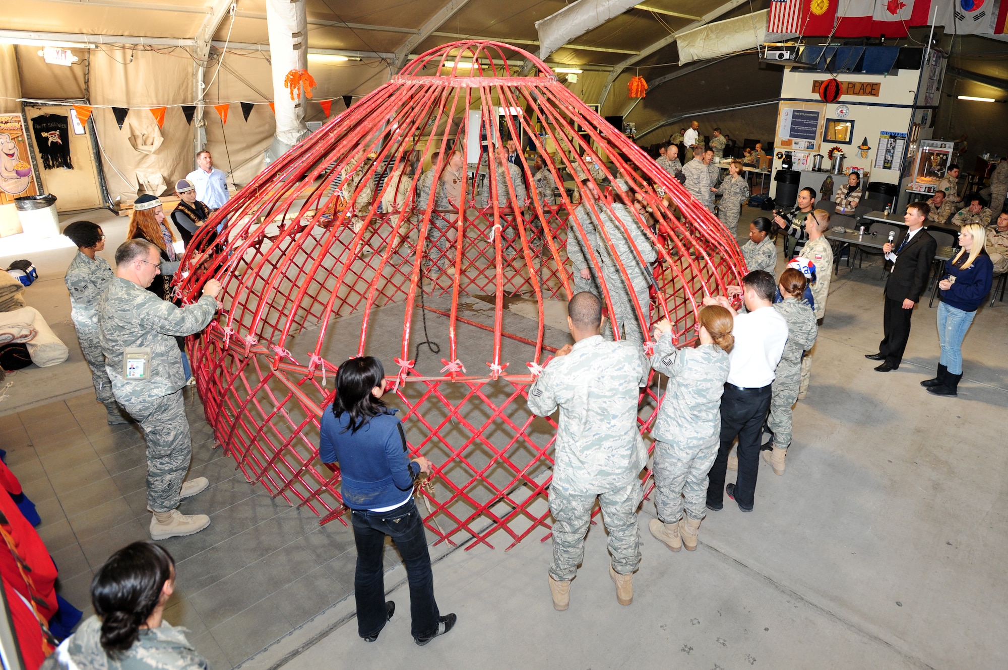 TRANSIT CENTER AT MANAS, Kyrgyzstan -- A traditional Kyrgyz Yurt is constructed by those stationed at Manas as part of Kyrgyz Culture Day at the Transit Center, Oct. 24, 2009. The yurt is made solely from wood, leather, and materials for walls and roofing. (U.S. Air Force photo/Senior Airman Steele C. G. Britton)