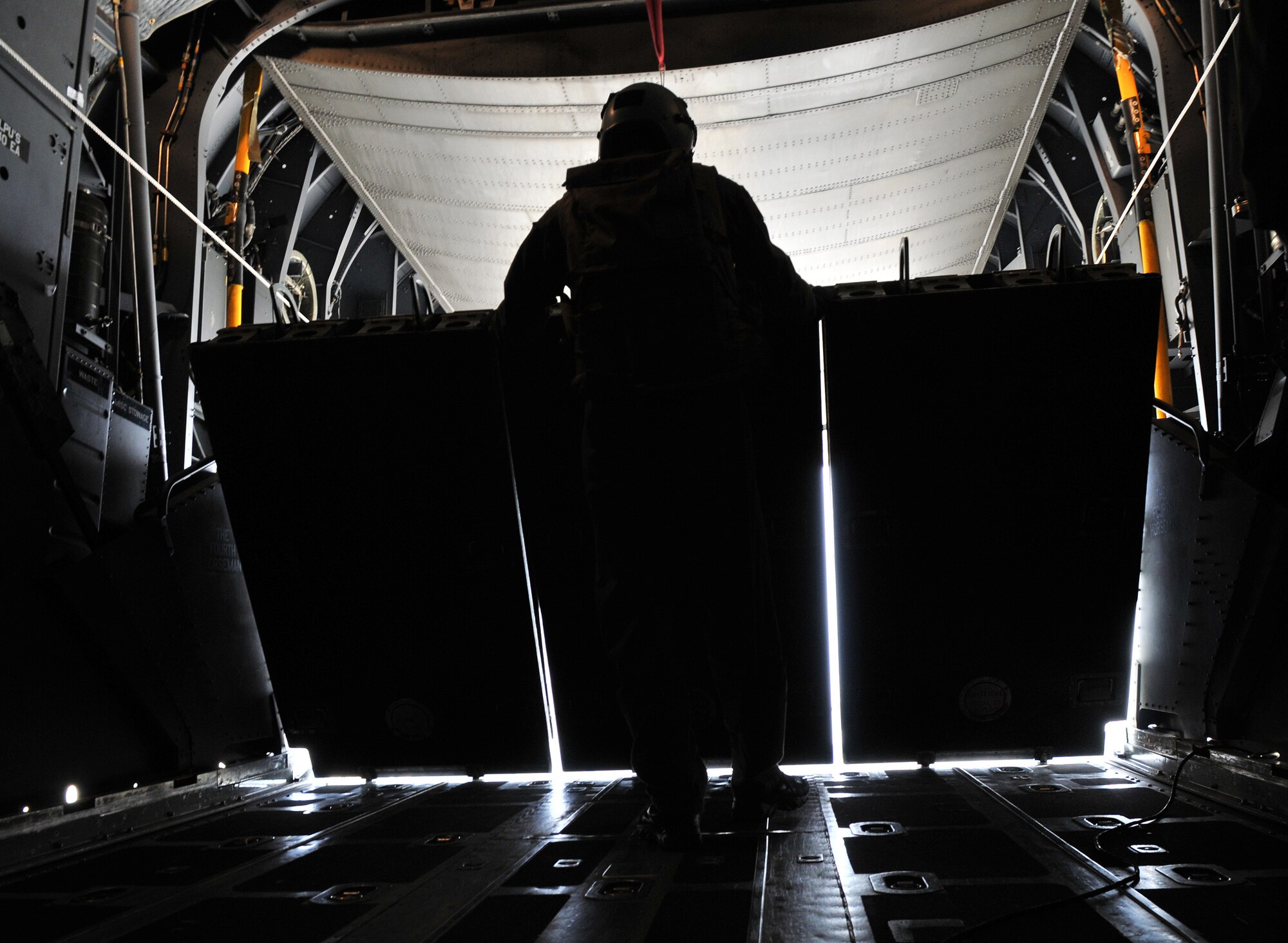 RAF MILDENHALL, England -- An Airman from the 352nd Special Operations Group prepares to lower the rear ramp on an MC-130H Combat Talon II at RAF Mildenhall Oct. 29. The SOG transported nearly 60 group and squadron commanders, their honorary commanders and spouses to a mock "Camp Kabul, Afghanistan" during the Honorary Commanders' Deployment Day. (U.S. Air Force photo by Tech. Sgt. Kevin Wallace)