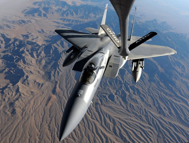 NEVADA TEST AND TRAINING RANGE, Nev. -- A U.S. Air Force F-15 Eagle from the 142nd Fighter Wing, Portland Air National Guard, Ore. flies toward the boom of an Ohio Air National Guard KC-135 Stratotanker over the Nevada Test and Training Range during Red Flag 10-1 on Oct. 29, 2009. Red Flag is a realistic combat training exercise involving the air forces of the United States and its allies. The exercise is conducted on the 15,000-square-mile Nevada Test and Training Range, north of Las Vegas.  (U.S. Air Force photo by Airman 1st Class Brett Clashman)(Released)