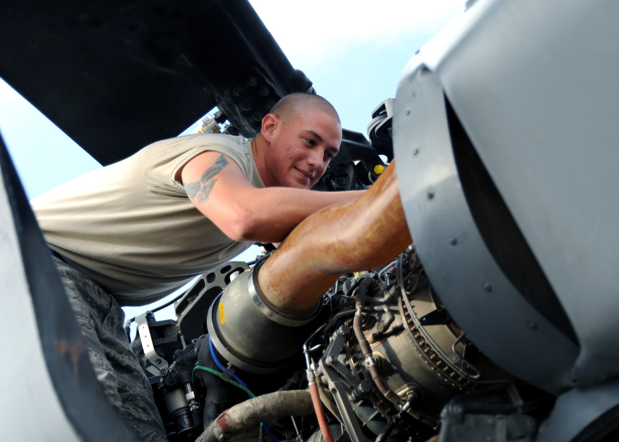 JOINT BASE BALAD, Iraq -- Senior Airman Casey Warner, 64th Expeditionary Helicopter Maintenance Unit crew chief, inspects the engine controls of an HH-60G Pave Hawk as part of a pre-flight inspection Oct. 27, 2009. The HH-60G Pave Hawk is maintained by Airmen with various specialties that include communications, navigation, engines, hydraulics, electronics, weapons systems and electronic counter warfare. (U.S. Air Force photo/Senior Airman Christopher Hubenthal)