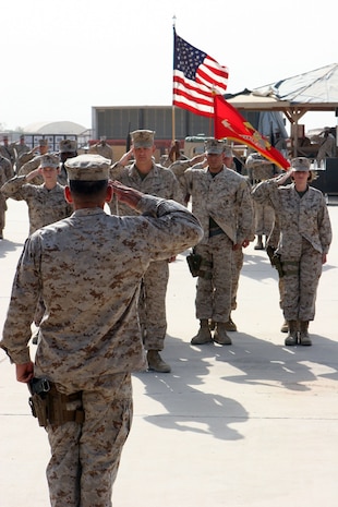 Brig. Gen. Juan G. Ayala, commanding general for the 2nd Marine Logistics Group (Forward), returns a salute to the 2nd MLG (Fwd) staff during a transfer of authority ceremony held aboard Camp Al Taqaddum, Iraq, Sept. 1, 2009. Ayala transferred authority to Col. Vincent A. Coglianese, commanding officer for the newly designated Combat Logistics Regiment 27 (Forward), which marks the first time in a five-year period that a regiment will take over the logistics combat element of the Marine Air Ground Task Force serving in Iraq. (Official U.S. Marine Corps photo by Lance Cpl. Patrick P. Evenson)