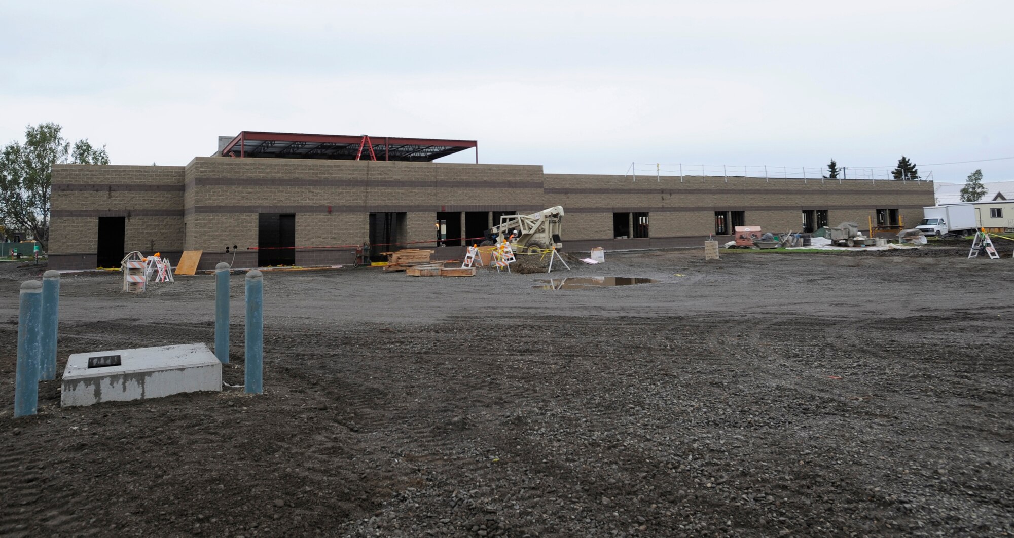 ELMENDORF AIR FORCE BASE, Alaska -- Construction continues on the future site of Elmendorf's Professional Military Education Center across the street from the Kashim Club Aug. 28. Construction on the site began May 26 and is slated to be completed June of 2010. The new facility is 22,000 square feet. (U.S. Air Force photo/Senior Airman Matthew Owens)