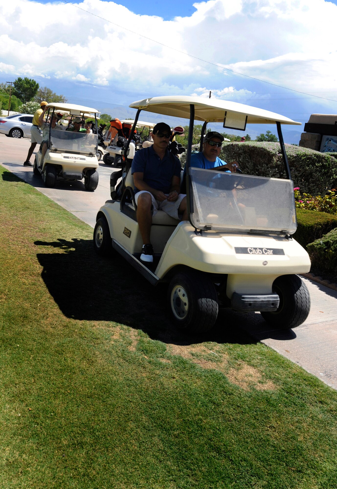 HOLLOMAN AIR FORCE BASE, N.M. -- Golfers head off to the tees during the Chief's Tournament here Aug. 27. The Chief's Group ran the tournament as a fundraiser to support the quality of life initiatives on base. (U.S. Air Force photo by Senior Airman Tiffany Trojca)