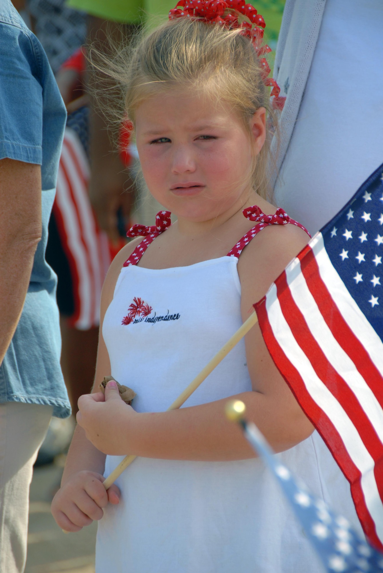 Family members of the 815th Airlift Squadron "Flying Jennies" bid farewell to their loved ones, who departed Keesler Air Force Base, Miss. Sept. 1 for their deployment to Southwest Asia. Sarah Israel watches the C-130J-30 carrying her father, Chris Israel, take off. Israel is one of the Airmen leaving in the second wave of deployments from the 403rd Wing. (Air Force Photo by Senior Airman Tabitha Dupas)