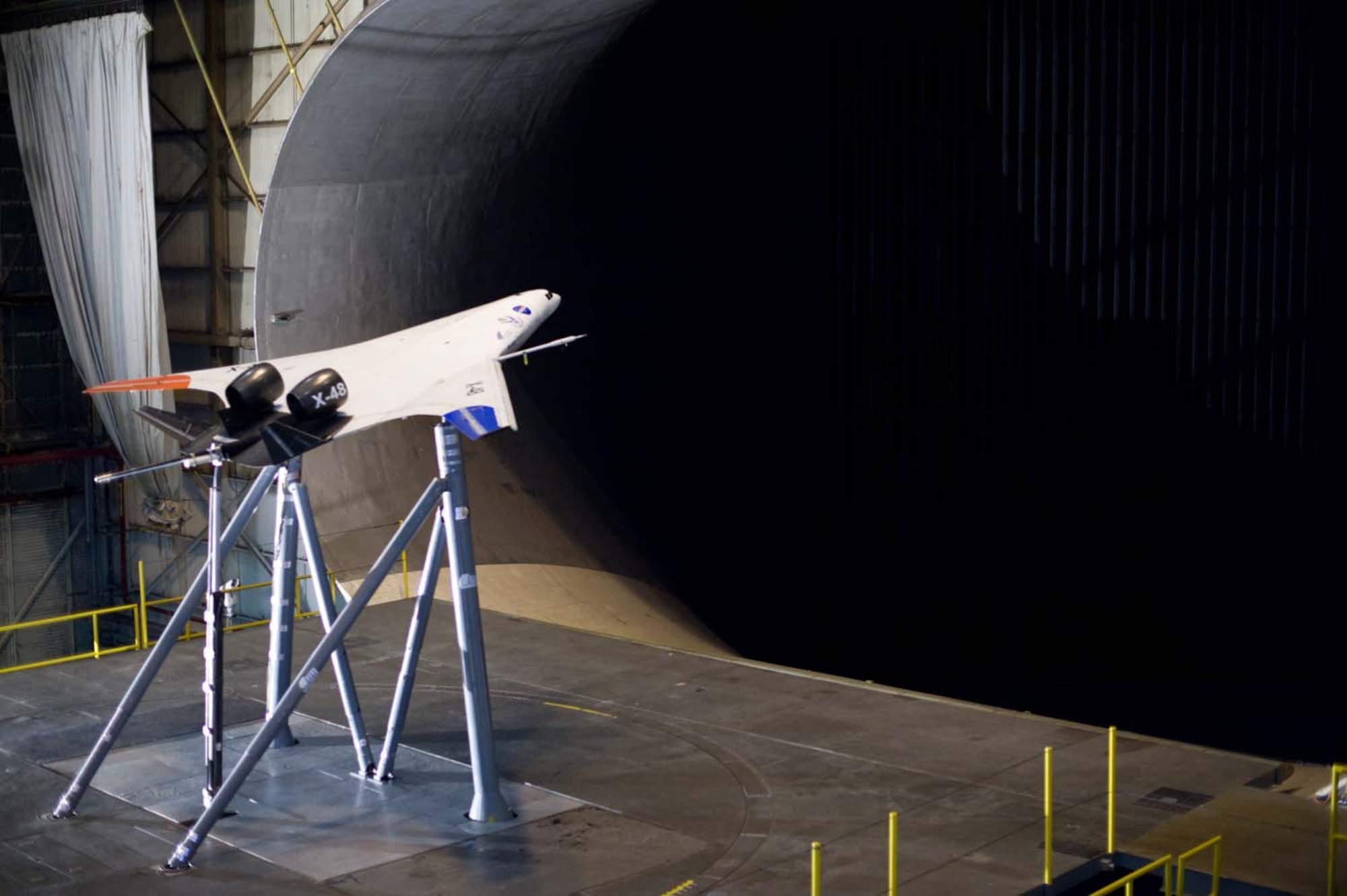 LANGLEY AIR FORCE BASE, Va. – An X-48C experimental aircraft is mounted in a full-scale wind tunnel here Aug. 31.  Old Dominion University operates the tunnel, which was built in 1930, for clients including NASA, Boeing Co. and the U.S. Air Force.  The tunnel measures 30x60 feet and is the largest university operated wind tunnel in the world.  The tunnel provides a controlled test environment to measure aerodynamic forces on vehicles.  ODU will cease wind tunnel testing on Sept. 4, and NASA's Langley Research Center will later dismantle the building because it is no longer strategically important to NASA’s aeronautical research.  (U.S. Air Force photo/Staff Sgt. Barry Loo)