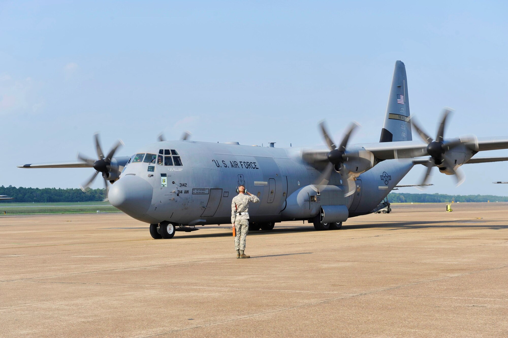 Col. C.K. Hyde, 314th Airlift Wing commander, taxis in a C-130J on the flightline after achieving his 4000th flight hour Aug. 27. (U.S. Air Force photo by Airman Lausanne Pacheco)