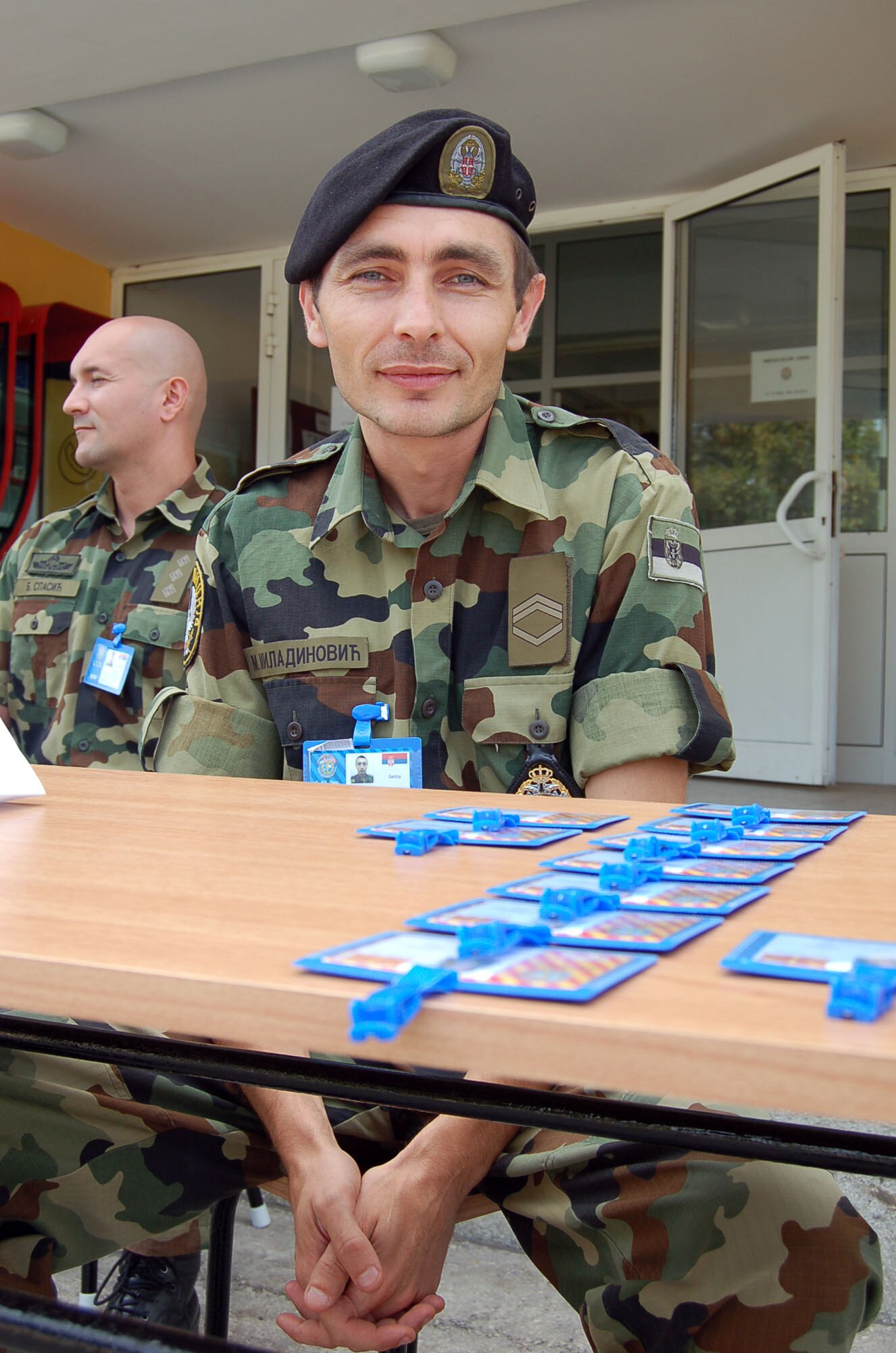 NIS, Serbia – Senior Sergeant Milos Miladinovic, Serbian Armed Forces Force Protection, waits to in-process participants of MEDCEUR 2009, a military medical training exercise in Central and Eastern Europe, Aug. 31. More than 600 people will participate in the exercise, scheduled for Sept. 2-13. (U.S. Air Force photo/Senior Airman Kali L. Gradishar)