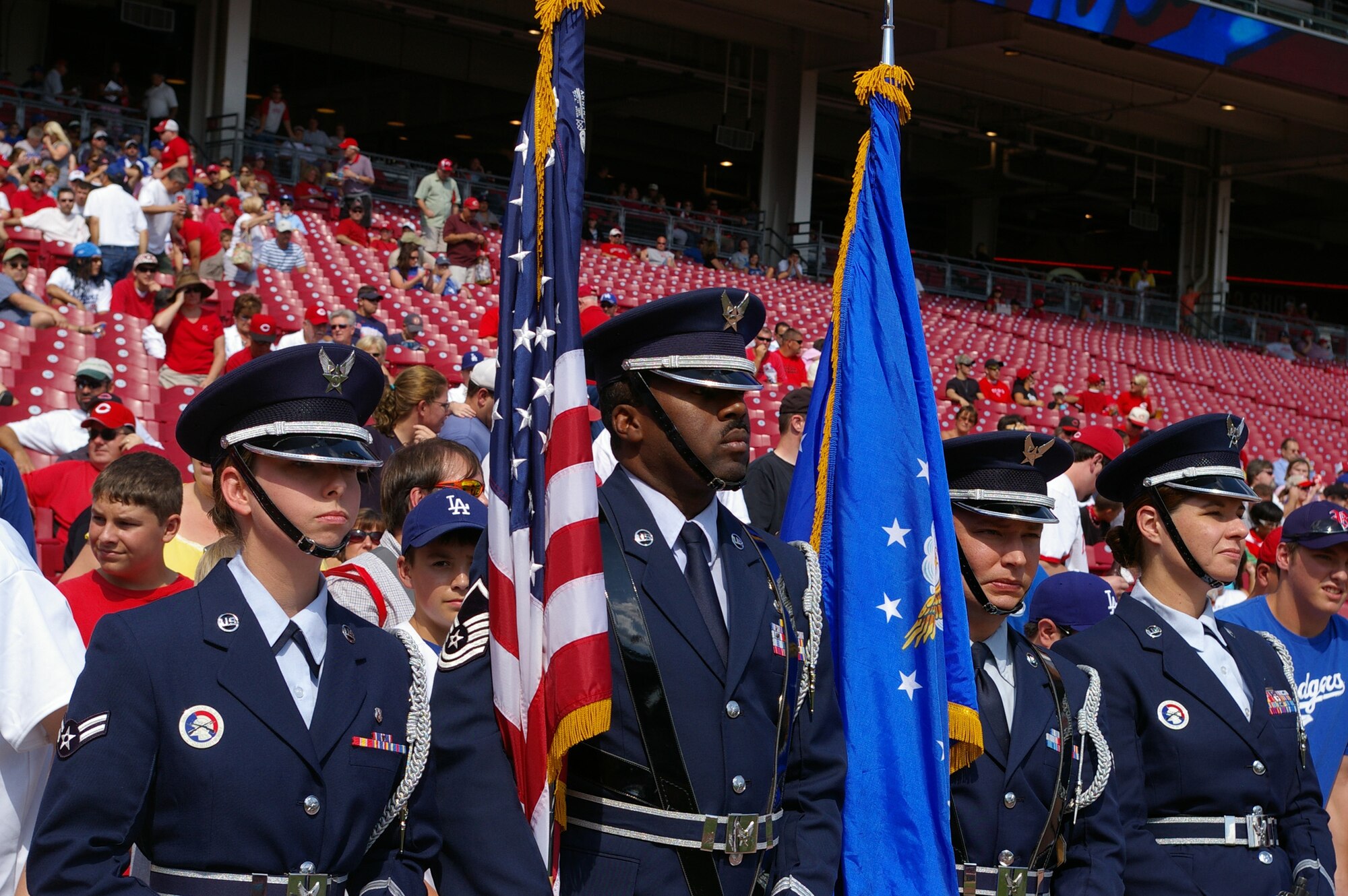 CINCINNATI, Ohio - The Wright-Patterson AFB Honor Guard prepares to post the colors at the Great American Ball Park, home of the Cincinnati Reds, during Military Appreciation Day Aug. 29, 2009.  Members of the honor guard include Airman 1st Class Rachel Mueller, Master Sgt. Mark Lyle, Senior Airman Gerhard Schumacher, and Staff Sgt. Cathy Ulmer.  (Air Force photo/Laura Darden)