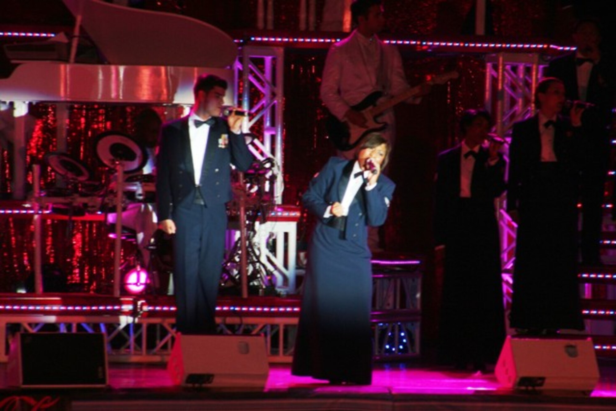 Tops in Blue, the Air Force's premier entertainment showcase, gives a performance at Scott Air Force Base, Ill., on Aug. 31, 2009.  Tops in Blue, the Air Force's premier entertainment showcase, serves as an expeditionary entertainment unit to provide quality entertainment from within Air Force resources for the Air Force family, with priority to Air Force personnel stationed worldwide at remote and deployed locations while simultaneously promoting community relations, supporting recruiting efforts and serving as ambassadors for the United States of America and the United States Air Force. Tops in Blue will perform next at Air Force Week Sacramento. (U.S. Air Force Photo/Tech. Sgt. Scott T. Sturkol)
