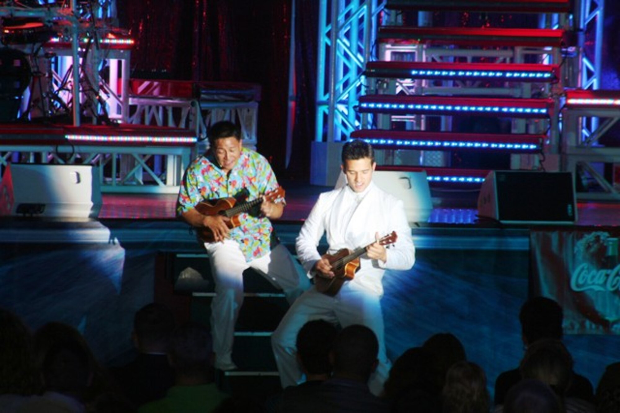 Tops in Blue, the Air Force's premier entertainment showcase, gives a performance at Scott Air Force Base, Ill., on Aug. 31, 2009.  Tops in Blue, the Air Force's premier entertainment showcase, serves as an expeditionary entertainment unit to provide quality entertainment from within Air Force resources for the Air Force family, with priority to Air Force personnel stationed worldwide at remote and deployed locations while simultaneously promoting community relations, supporting recruiting efforts and serving as ambassadors for the United States of America and the United States Air Force. Tops in Blue will perform next at Air Force Week Sacramento. (U.S. Air Force Photo/Tech. Sgt. Scott T. Sturkol)
