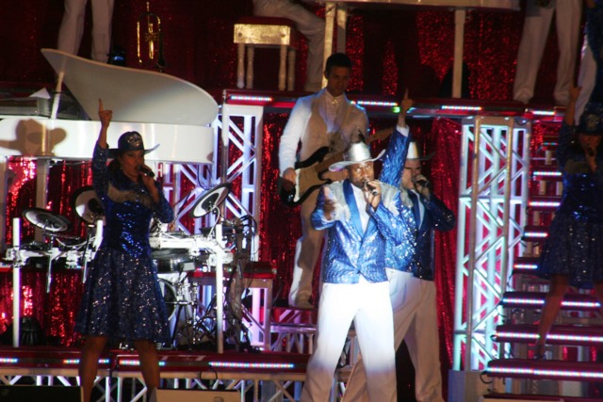 Tops in Blue, the Air Force's premier entertainment showcase, gives a performance at Scott Air Force Base, Ill., on Aug. 31, 2009.  Tops in Blue, the Air Force's premier entertainment showcase, serves as an expeditionary entertainment unit to provide quality entertainment from within Air Force resources for the Air Force family, with priority to Air Force personnel stationed worldwide at remote and deployed locations while simultaneously promoting community relations, supporting recruiting efforts and serving as ambassadors for the United States of America and the United States Air Force. Tops in Blue will perform next at Air Force Week Sacramento. (U.S. Air Force Photo/Tech. Sgt. Scott T. Sturkol)
