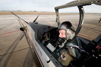 Capt. Damien Ludwick, 559th FTS, completes a pre-flight check prior to a training flight in a T-6 Texan II at Randolph AFB, Texan. (U.S. Air Force photo/Dave Terry)