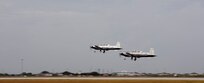 A pair T-6 Texan II assigned to the 559th Flying Training Squadron conduct a formation takeoff during a Pilot Instructor Training sortie at Randolph Air Force Base, Texas.  (U.S. Air Force photo/Steve Thurow)