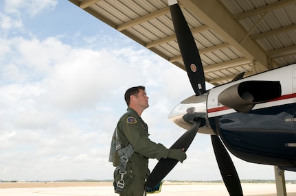 First Lt. Matt Zenishek, 33rd FTS, 71st FTW Vance AFB performs a pre-flight inspection on a T6 Texas II aircraft at Randolph AFB.
19 Aug 2009 (U.S. Air Force photo/Joel Martinez)
