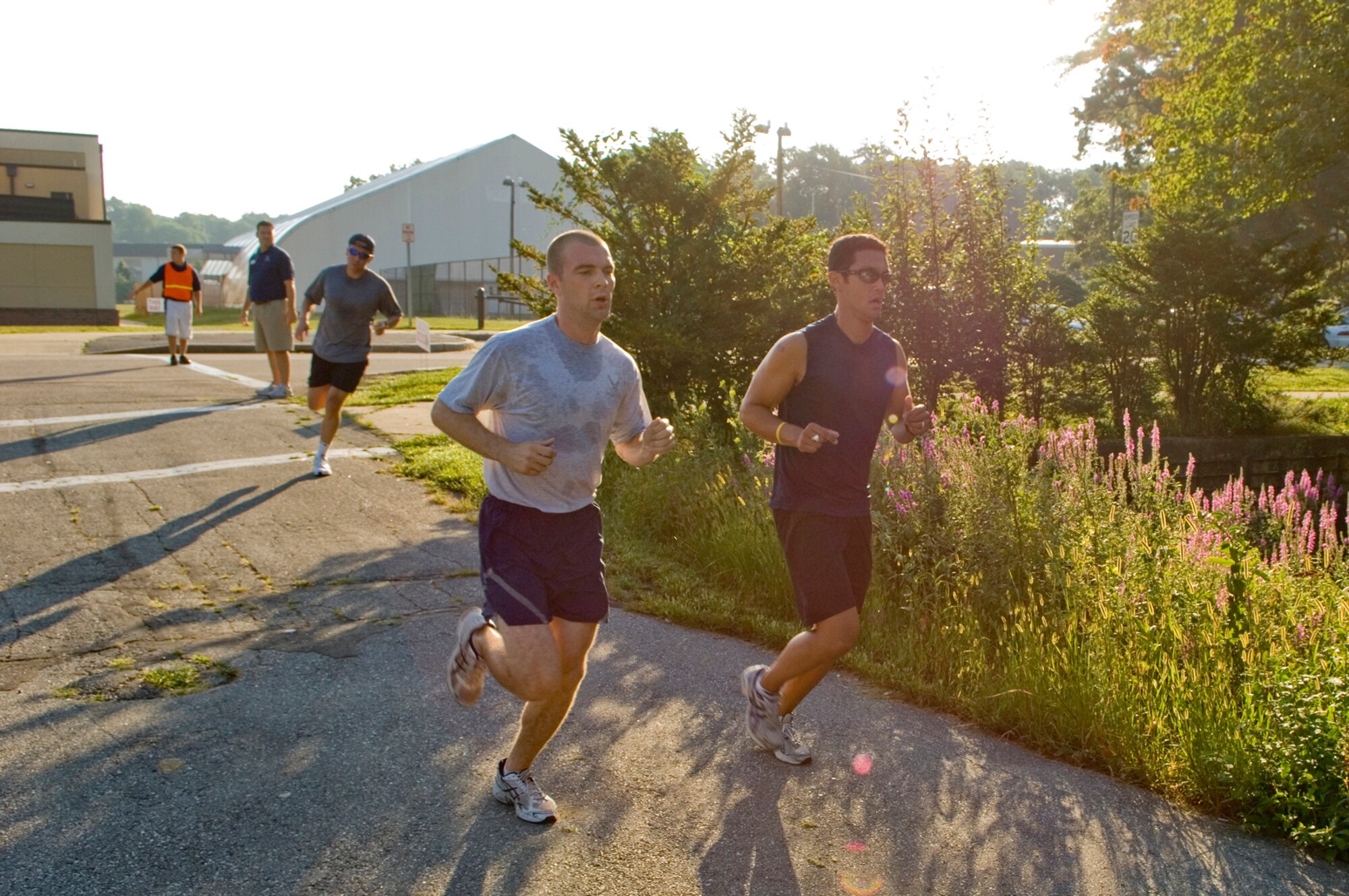 HANSCOM AIR FORCE BASE, Mass. –Hanscom personnel compete in the third annual Dog Days of August 5K Fun Run on Aug. 26, sponsored by the 66th Force Support Squadron. The 66 FSS Fitness and Sports Center offers a number of programs and services to help keep Hanscom community members ‘Fit to Fight,’ for more information go to www.hanscomservices.com.  (U.S. Air Force photo by Mark Wyatt)

