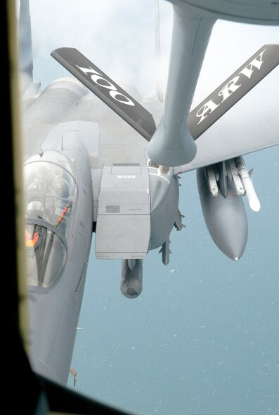 RAF MILDENHALL, England --  An RAF Lakenheath F-15E Strike Eagle prepares to receive fuel from an RAF Mildenhall KC-135 Stratotanker Aug. 26. Four local school teachers witnessed the event during their community orientation flight. (US Air Force photo/Tech. Sgt. Kevin Wallace)