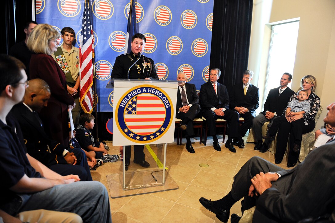 Retired U.S. Marine Corps Capt. Dan Moran addresses the audience during