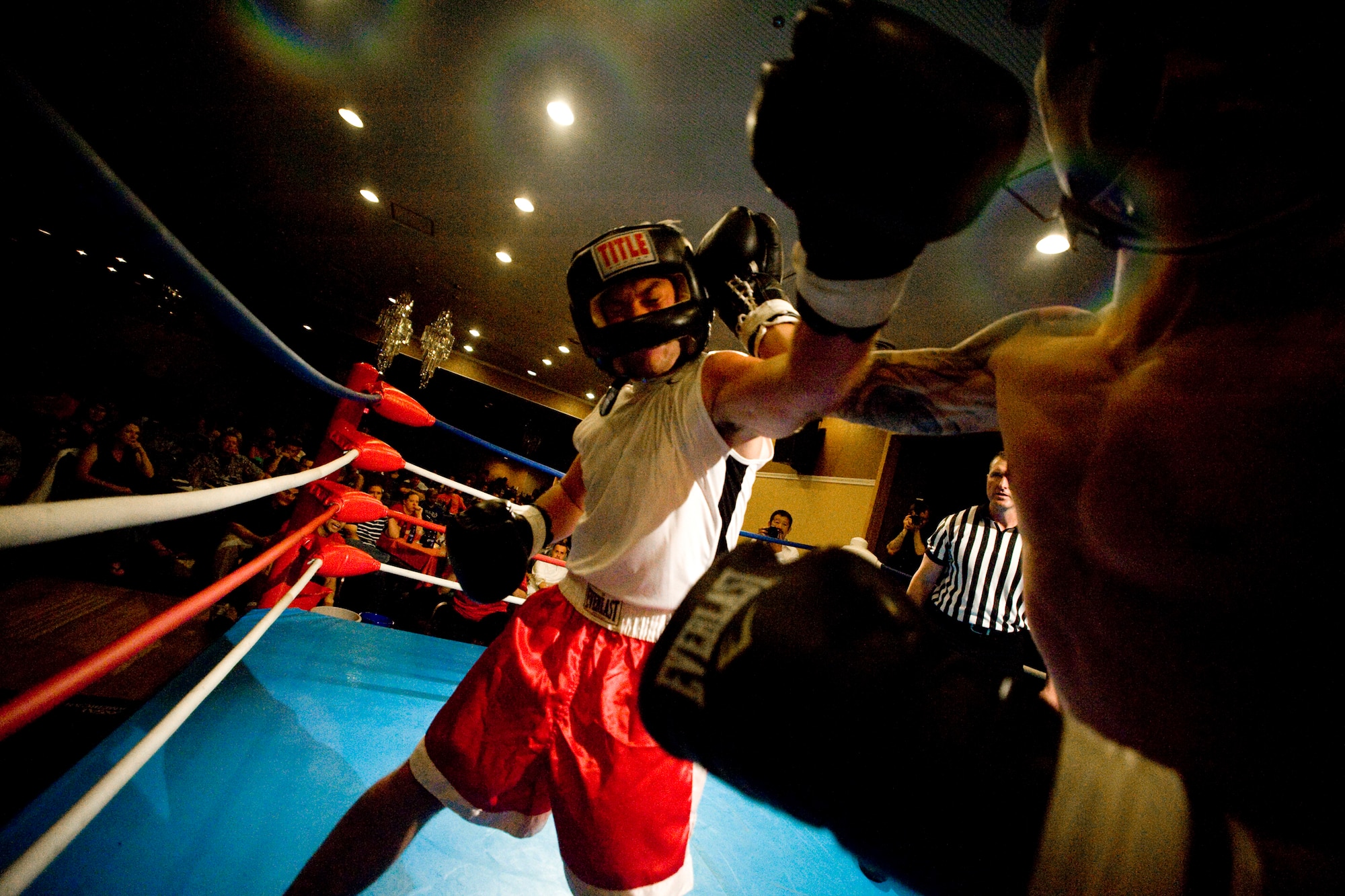 MISAWA AIR BASE, Japan -- Christopher Mendonca lands a left jab to Philip Davis during their Friday Night Fight Night light heavyweight bout Aug. 28. Despite his effort, Mendonca lost the match by decision. (U.S. Air Force photo/Senior Airman Jamal D. Sutter)