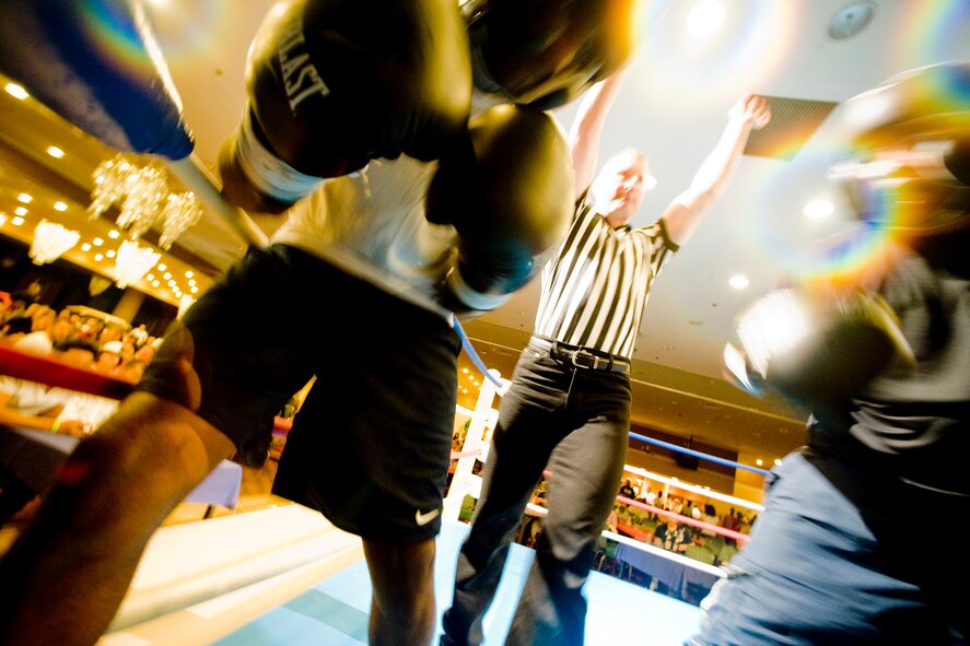 MISAWA AIR BASE, Japan -- Octavius Sails, left, and Tony Lewis, right, square off during their Friday Night Fight Night heavyweight bout Aug. 28. Lewis won the match by technical knock-out in the second round. (U.S. Air Force photo/Senior Airman Jamal D. Sutter)