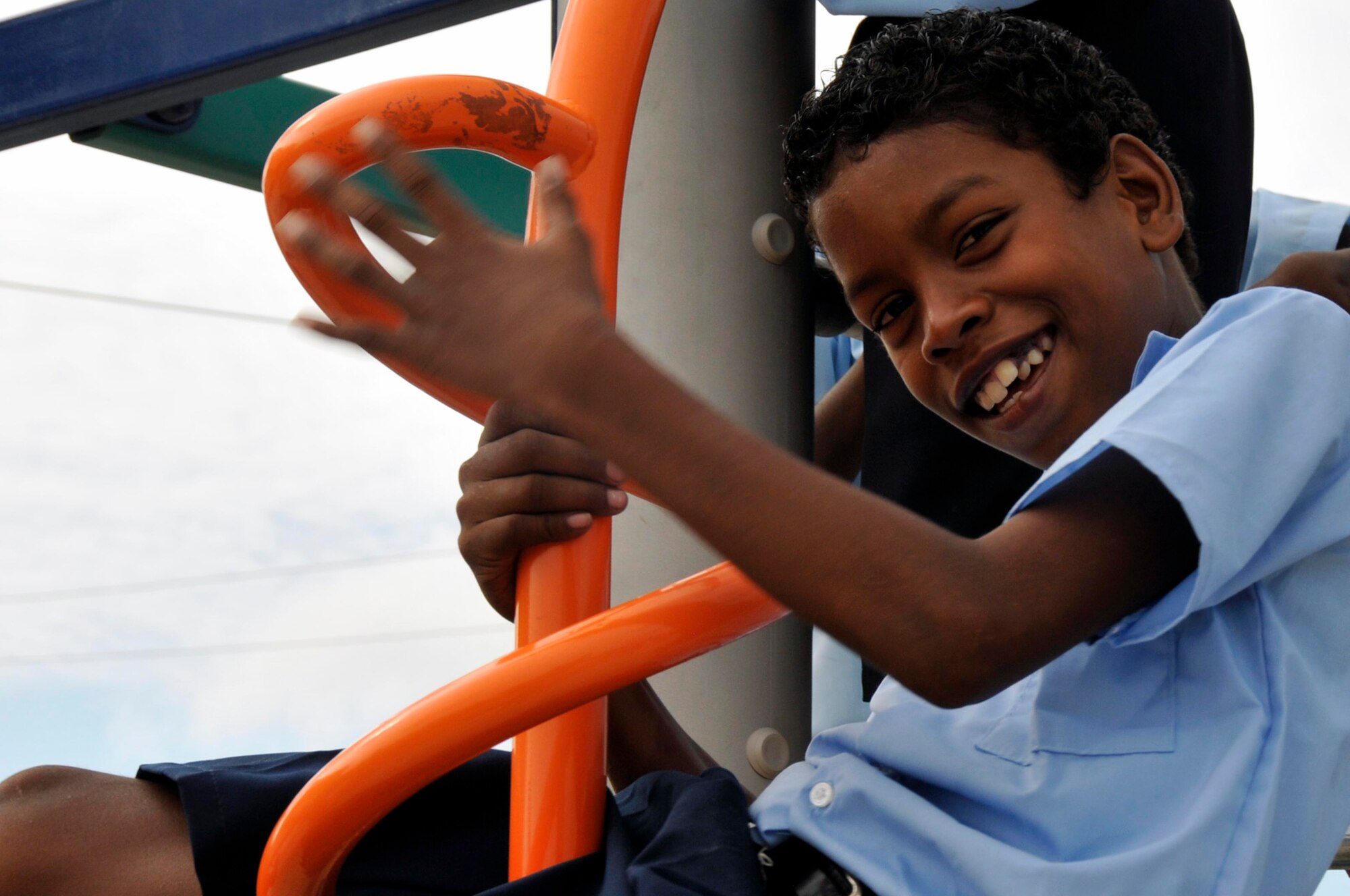A Guyanese Boy plays on a brand new playground Sept. 1, 2009, at the Bel Air Primary, and Nursery Schools Georgetown, Guyana. U.S. Airmen built a playground for the primary school children, and one for the nursery school children, totaling over $ 37,000. (U.S. Air Force photo by Airman 1st Class Perry Aston) (Released)