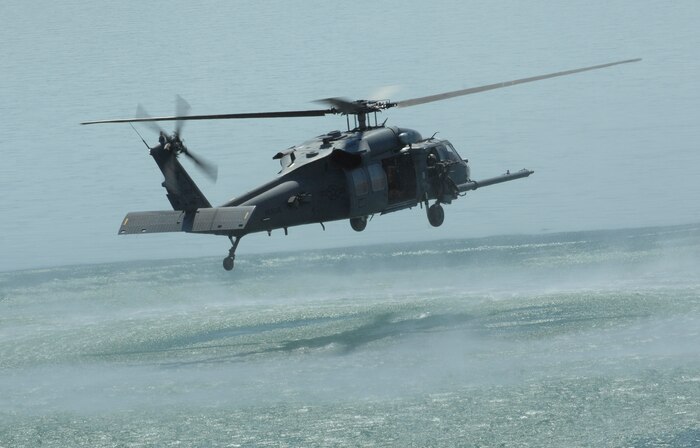 An Air Force HH-60 Pave Hawk, 66th Rescue Squadron from Nellis Air Force Base, Nev. holds in a hover position over Lake Mead during water rescue training Aug. 24, 2009.  
(U.S. Air Force photo/ Master Sgt. Kevin J. Gruenwald)





















  












 











































  












 

























