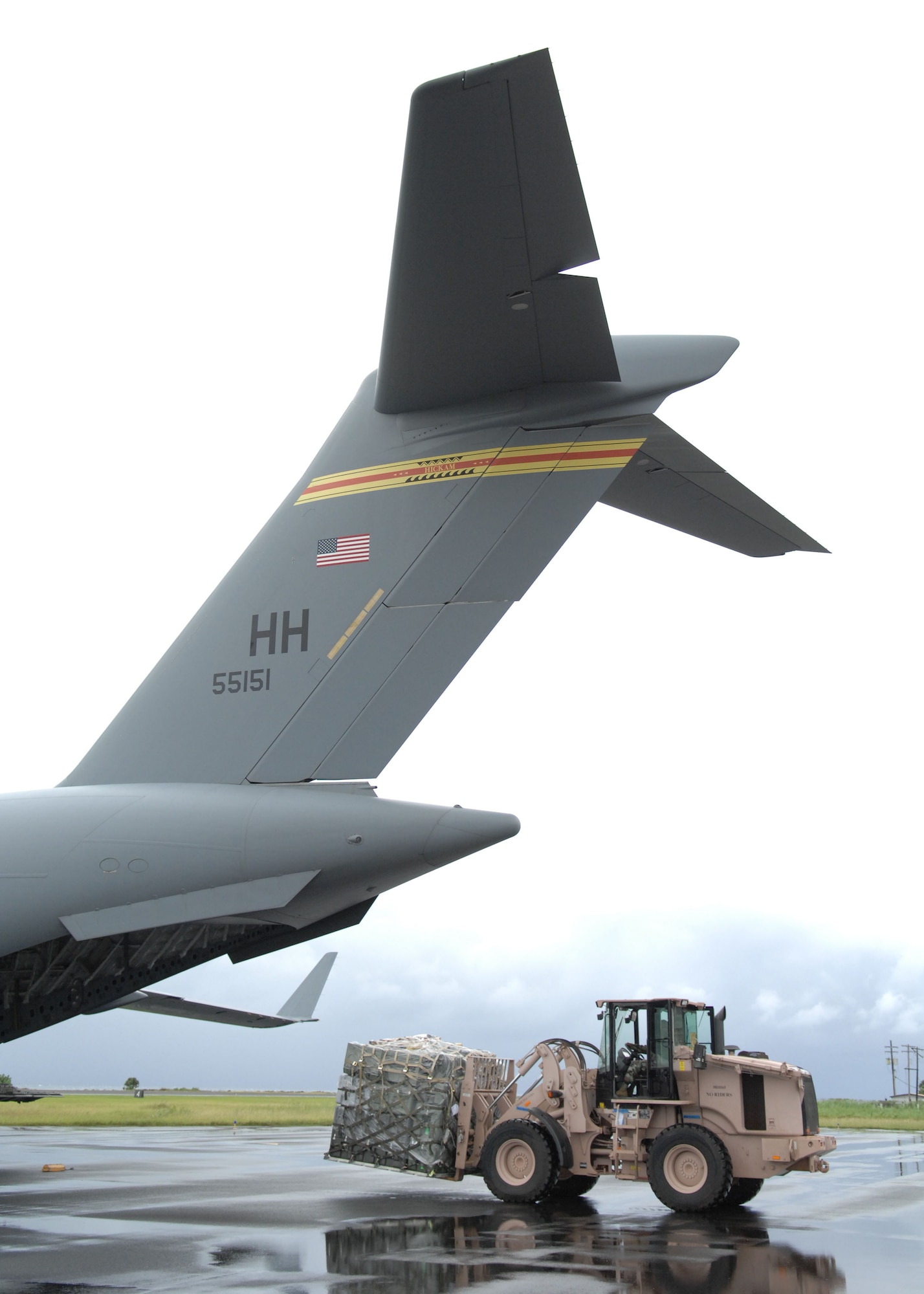 Airmen unload a C-17 Globemaster III from the 15th Airlift Wing at Hickam Air Force Base, Hawaii, during the Humanitarian Assistance Rapid Response Team validation exercise Sept. 2 on Chuuk in the Federated States of Micronesia.  The HARRT is the Air Force?s new expeditionary medical capability designed to deploy within 24 hours of notice during disaster relief operations.  Based at Andersen Air Force Base, Guam, the team can set up a fully-operational medical clinic within six hours after landing and treat 350 to 500 patients per day.  (U.S. Air Force photo/Capt. Andrew Hoskinson)

