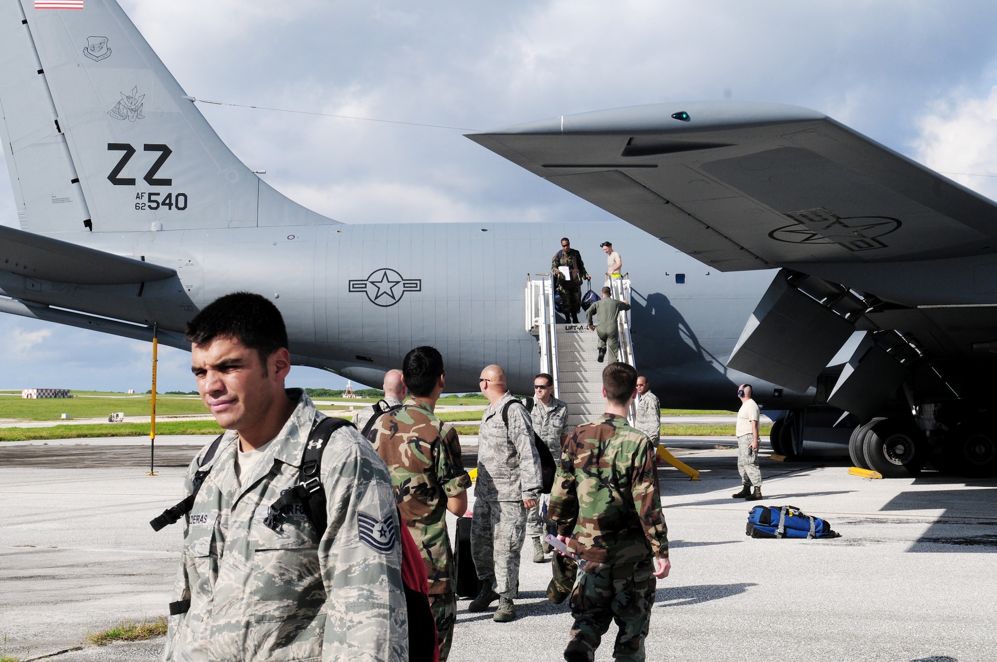 Airmen from the 18th Wing at Kadena Air Base, Japan, arrive at Andersen Air Force Base, Guam, Aug. 31 as part of a test of the wing's deployment capabilities. (U.S. Air Force photo/Tech. Sgt. Mike Tateishi)