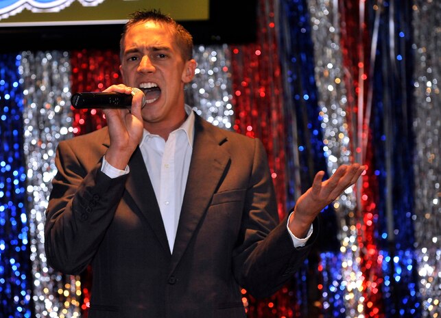 Staff Sgt. Shawn Summers sings "I'm Losing You" in the Charleston Air Mobility Command Icon talent contest here Aug. 28. Sergeant Summers won second place in the local contest and will represent Charleston AFB at the command-level AMC Icon competition. Sergeant Summers is a crew chief with the 315th Aircraft Maintenance Squadron. (U.S. Air Force photo/James M. Bowman)
