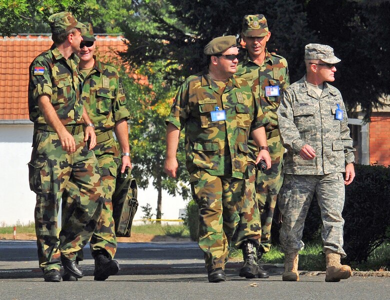 Col. Tim Brown (right) receives a tour of the Knez Mihailo Barracks grounds from a group of Serbian armed forces officers Aug. 29, 2009 in Nis Serbia. Colonel Brown, along with 31 fellow 435th Air Ground Operations Wing members, deployed to Serbia for two weeks in support of the Medical Training Exercise in Central and Eastern Europe 2009. Colonel Brown is the 435th Expeditionary Air Ground Operations Group commander. (U.S. Air Force photo/Staff Sgt. Markus M. Maier)