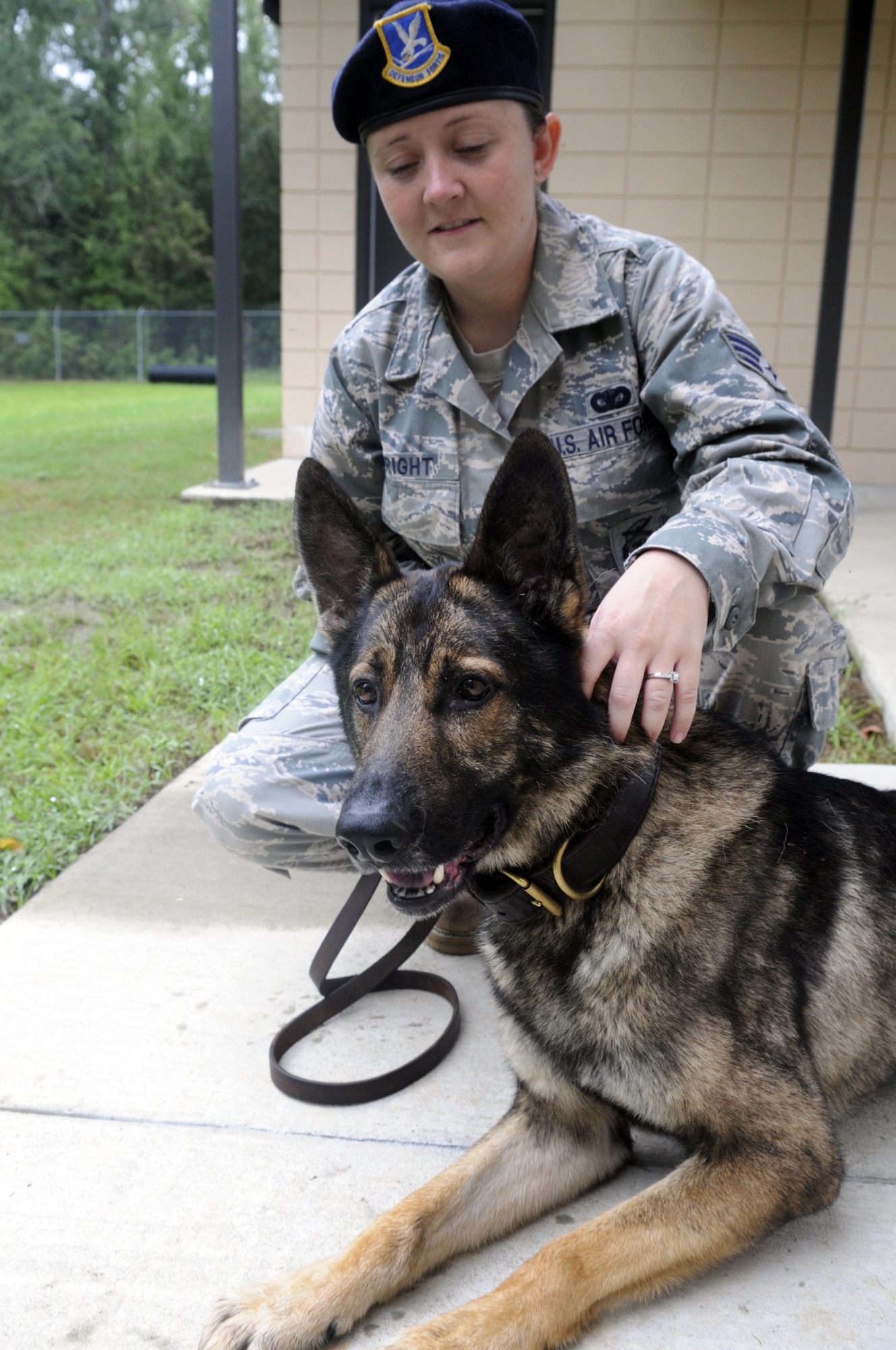 SrA Jamie Wright, 78th SFS, and  Beny, military working dog, have recently returned from a deployment in Iraq. U. S. Air Force photo by Sue Sapp