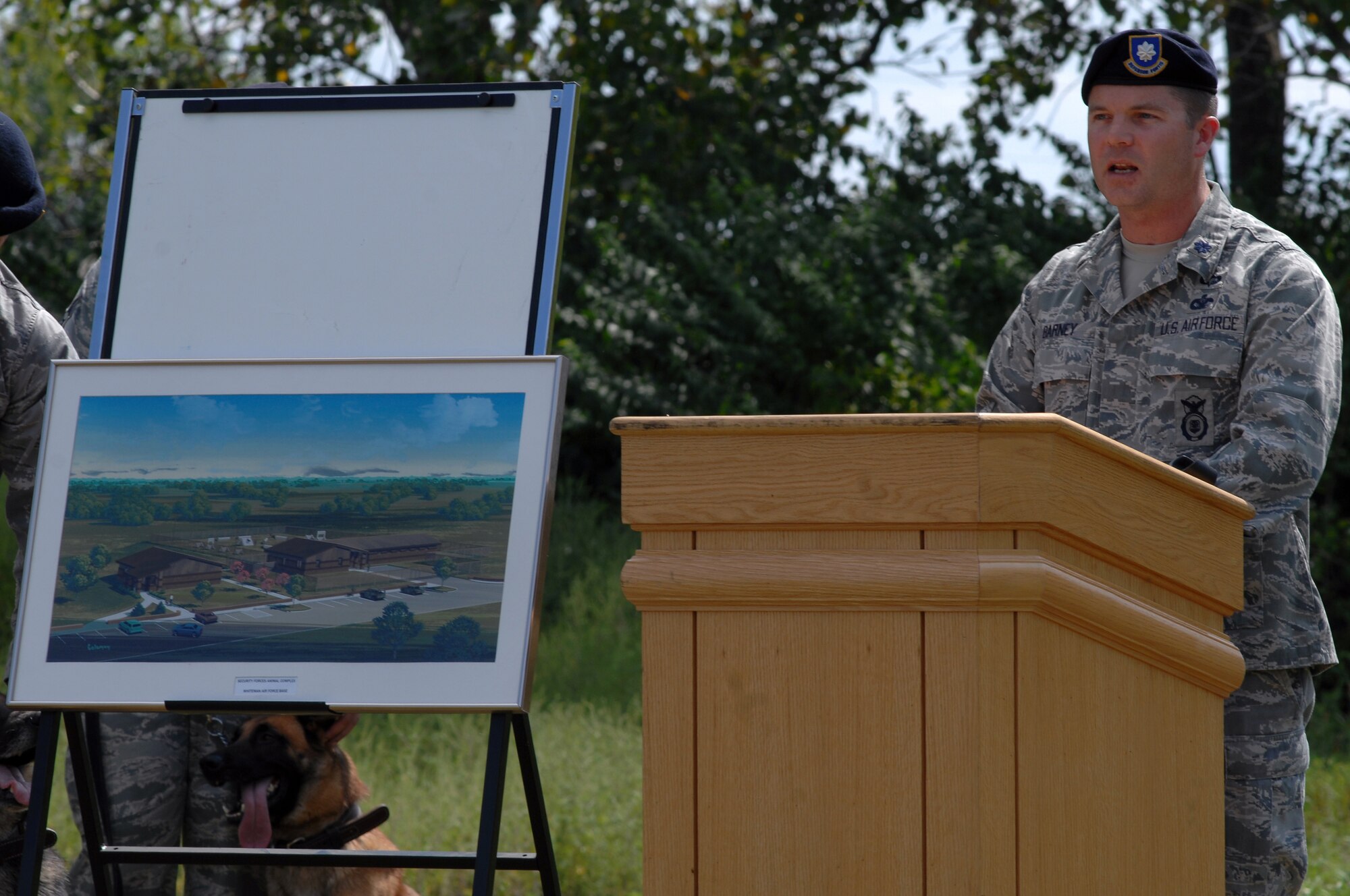 WHITEMAN AIR FORCE BASE, Mo. - Lt. Col. Paul Barney, 509th Security Forces Squadron commander, discuses the features of a new military working dog facility being built during a ground breaking ceremony Sept. 1. (U.S. Air Force photo/Senior Airman Kenny Holston)  