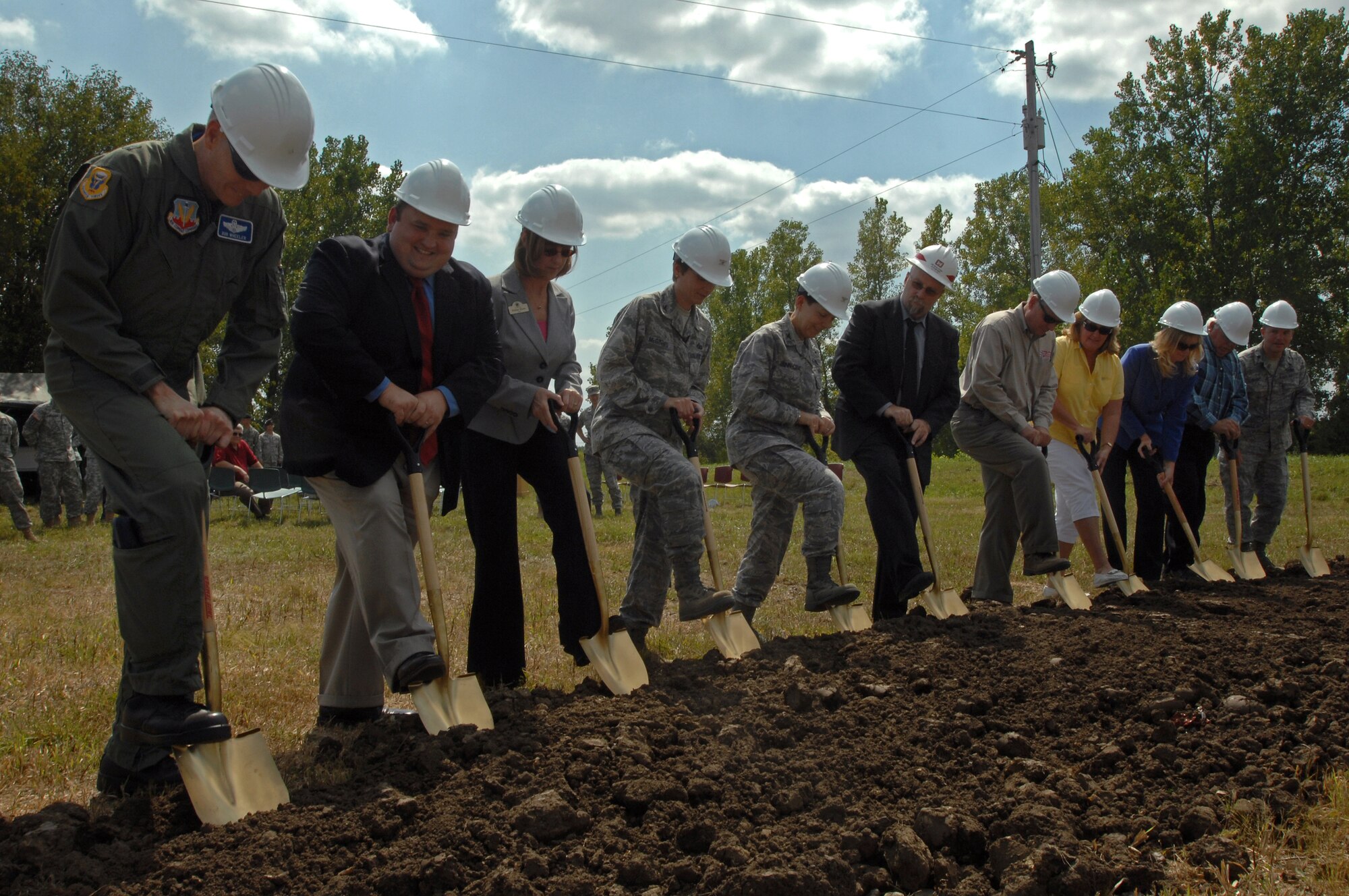 WHITEMAN AIR FORCE BASE, Mo. - Brig. Gen. Robert Wheeler, 509th Bomb Wing commander (far left) and other distinguished visitors break ground on a new 509th SFS military working dog facility Sept. 1. (U.S. Air Force photo/Senior Airman Kenny Holston)  