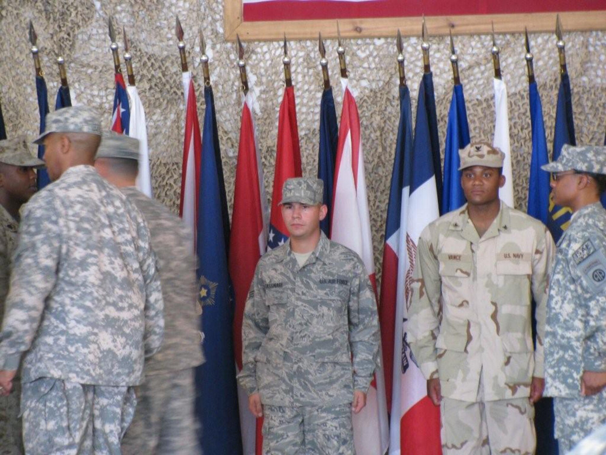 Two Westover Airmen took part in a Fourth of July joint re-enlistment ceremony held at Bagram Air Force Base.  Staff Sgt. Gregory Paczkowski and Senior Airman Anthony Tassinari both re-enlisted as part of the ceremony that was officiated by Major General Curtis M. Scaparrotti, United States Army, Commander of the 82nd Airborne. The ceremony took place in the Clamshell at Bagram AFB. The Combined Joint Task Force-82 Band performed the Army, Marine, Navy and Air Force songs in recognition of each branch.  Each re-enlistee was presented the Major General?s coin.