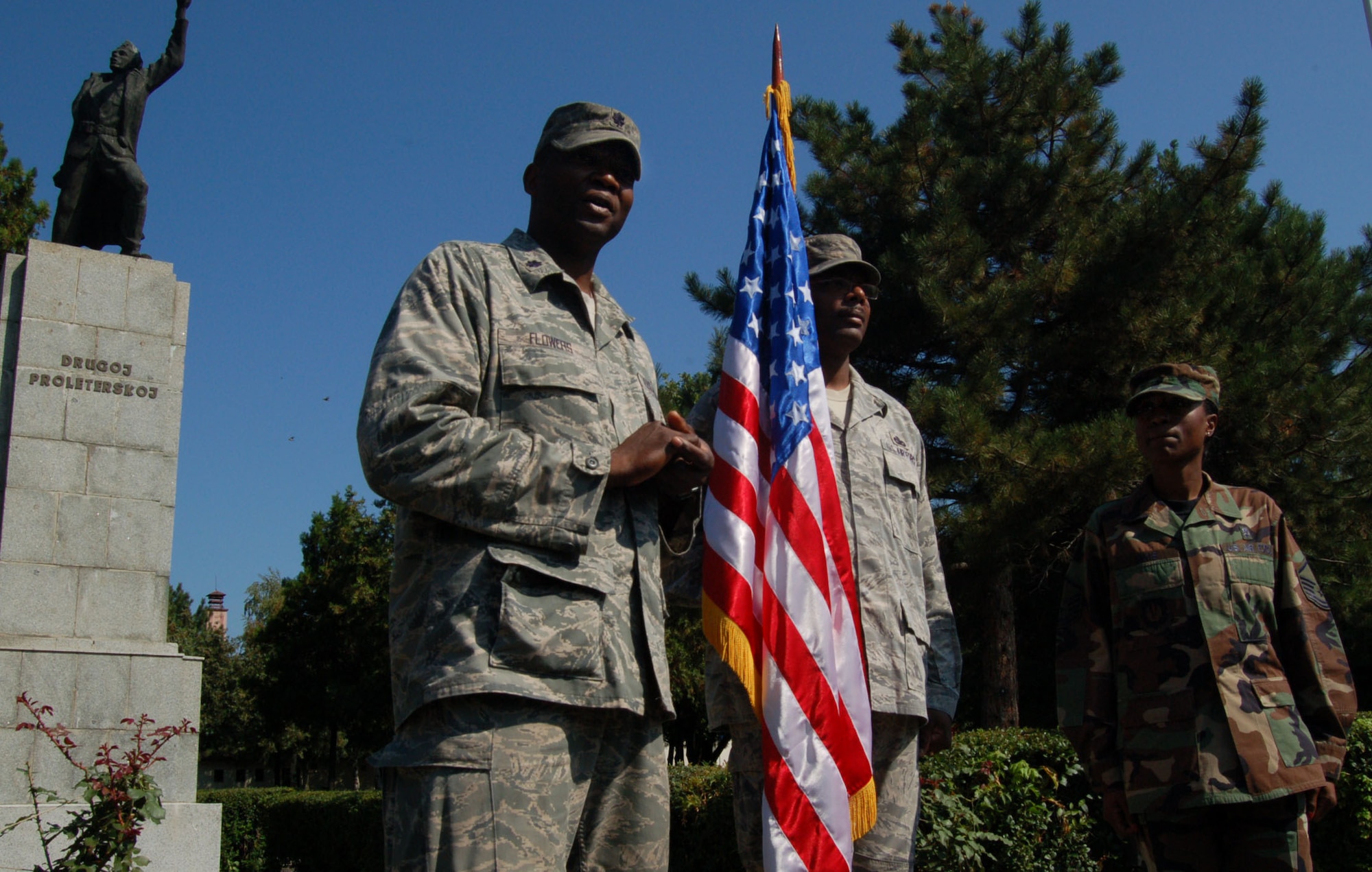 NIS, Serbia – Lt. Col. Alfred Flowers, 86th Medical Support Squadron commander at Ramstein Air Base, Germany, speaks to the relevance of him re-enlisting Master Sgt. Yoketha Sims, 86th Medical Group medical logistician also at Ramstein AB, during her re-enlistment Sept. 2 after the opening ceremony of the military medical training exercise in Central and Eastern Europe, better known as MEDCEUR 2009. I was the flight commander in 2000 for the 22nd Medical Support Squadron at McConnell Air Force Base, Kan., she was the medical logistics NCO in charge, and we were re-united at Ramstein,? said Colonel Flowers. It's a small Air force. (U.S. Air Force photo/Senior Airman Kali L. Gradishar)