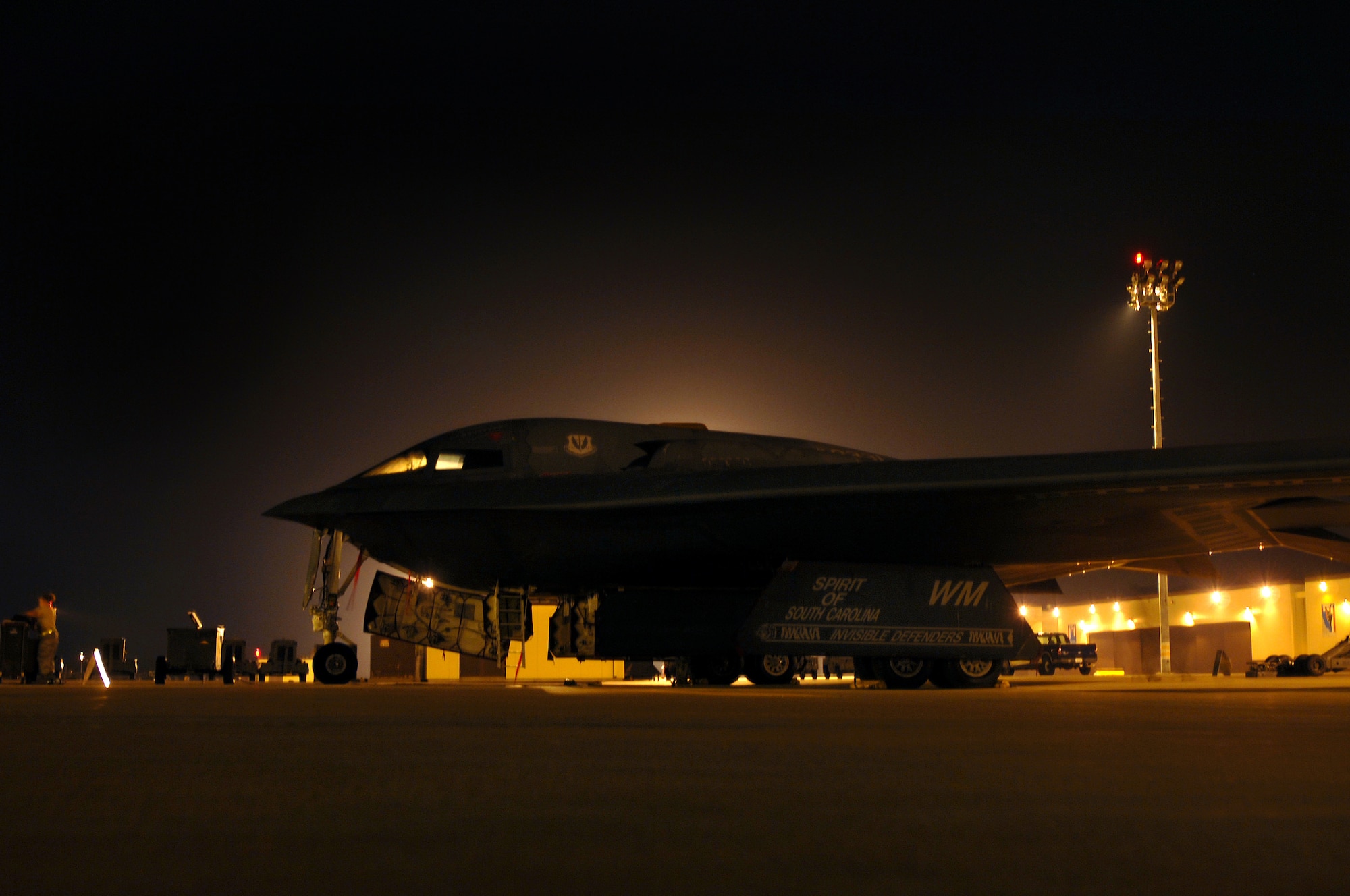 WHITEMAN AIR FORCE BASE, Mo. - Members of the 509th Aircraft Maintenance Squadron, prepare a B-2 Spirit, to be towed, August 27. The B-2 Spirit is scheduled for a wash, every 180 days and takes one to two days to complete. (U.S. Air Force photo/Senior Airman Kenny Holston)