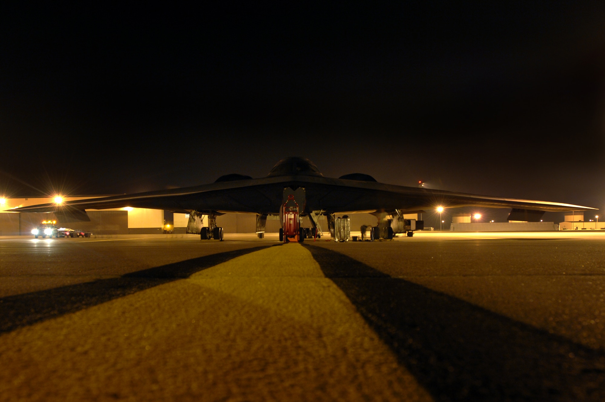 WHITEMAN AIR FORCE BASE, Mo. - Members of the 509th Aircraft Maintenance Squadron, prepare a B-2 Spirit, to be towed, August 27. The B-2 Spirit is scheduled for a wash, every 180 days and takes one to two days to complete. (U.S. Air Force photo/Senior Airman Kenny Holston)