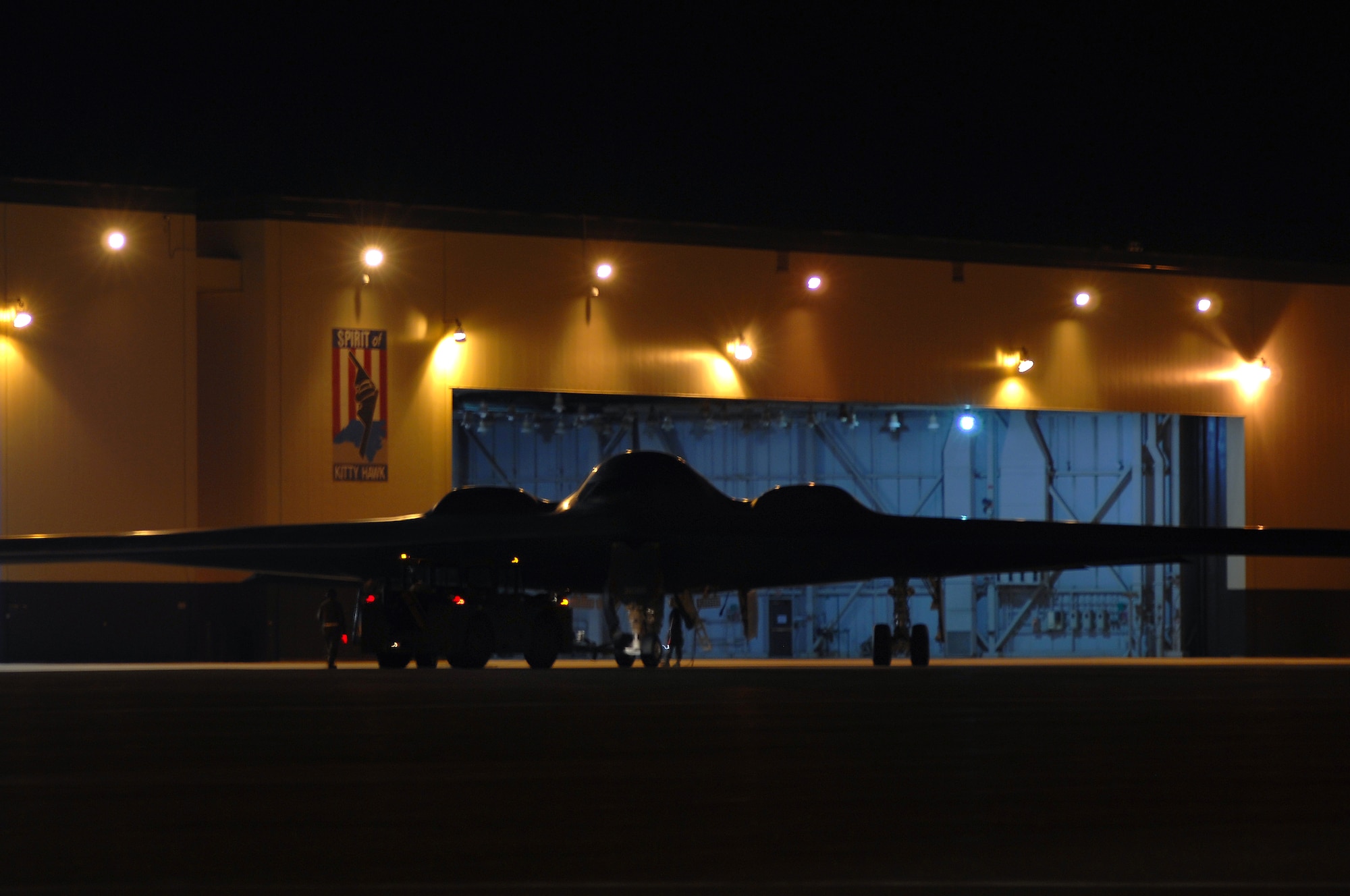 WHITEMAN AIR FORCE BASE, Mo. - Crew chiefs from the 509th Aircraft Maintenance Squadron prepare to put a B-2 Spirit into a dock August 27. Twenty B-2 Spirit aircrafts are assigned to the 509th Bomb Wing. The B-2's primary mission is to attack time-critical targets early in a conflict to minimize an enemy's war-making potential. (U.S. Air Force photo/Senior Airman Kenny Holston)