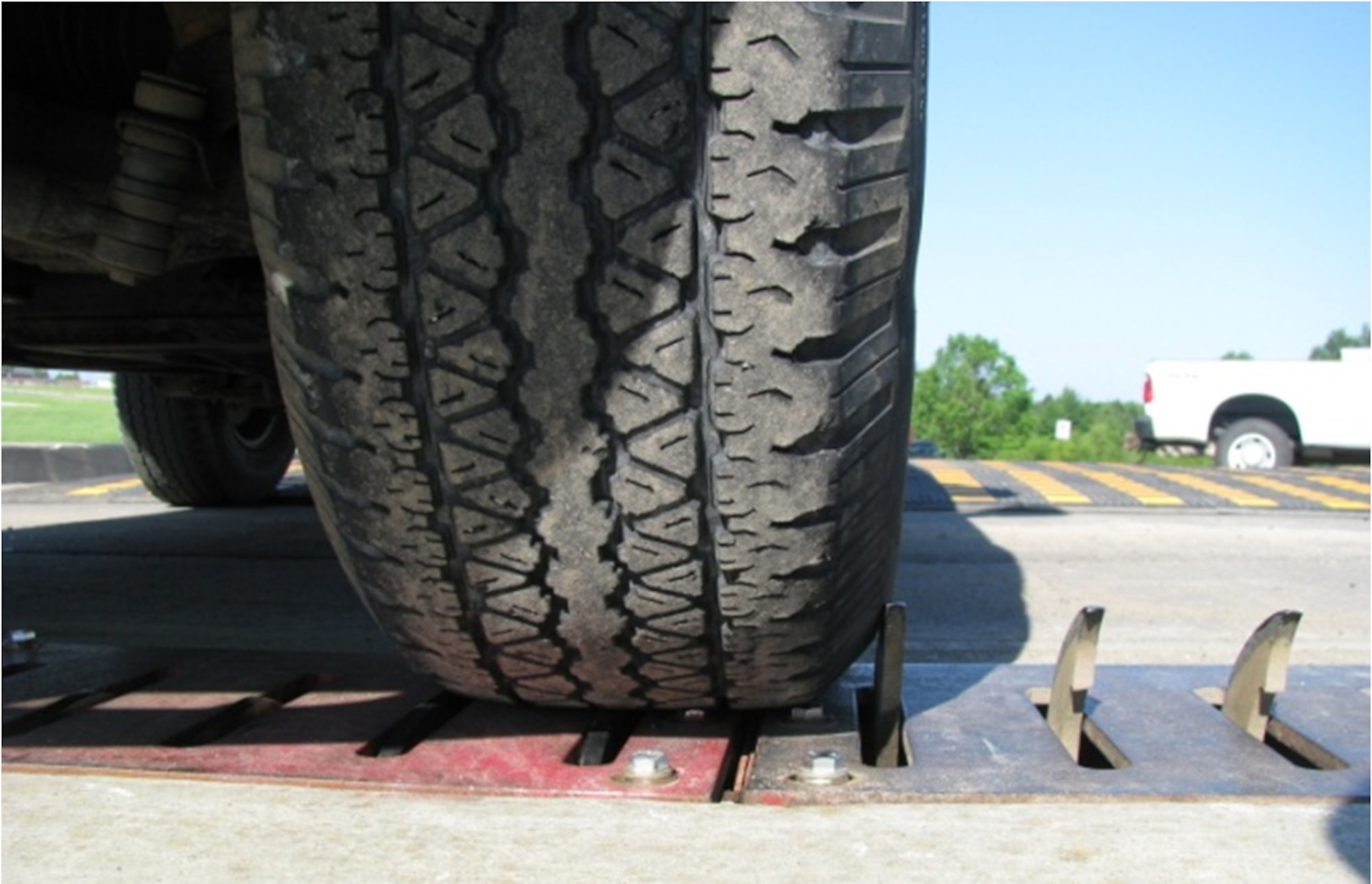 WHITEMAN AIR FORCE BASE, Mo. - Pictured here, steel anti-terrorism/force-protection spikes have recently been installed at each gate on the out-bound lanes to enhance base security. Base personnel are urged to be cautious when driving over the spikes to prevent tire damage. (Courtesy photo)