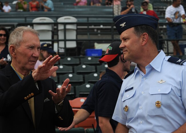 Col. Don Shaffer joins retired Maj.Gen. James Livingston, a Medal of Honor recipient, for a chat before the start of a Charleston RiverDogs baseball game during military appreciation night Aug. 26 at Joseph P. Riley Jr. Park in Charleston. Colonel Shaffer is the 437th Airlift Wing vice commander and General Livingston is a retired member of the Marine Corps.(U.S. Air Force photo/Senior Airman Katie Gieratz)