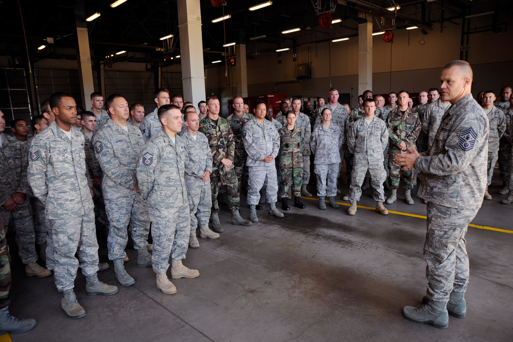 Chief Master Sgt. of the Air Force James Roy (right) addressed Airmen at the Peterson fire station Aug. 27. While at Peterson, Chief Roy discussed key focus areas such as training, base development and the Year of the Air Force Family in his first visit here since his appointment as the Air Force’s senior-ranking enlisted member in June. (Air Force photo by Craig Denton)