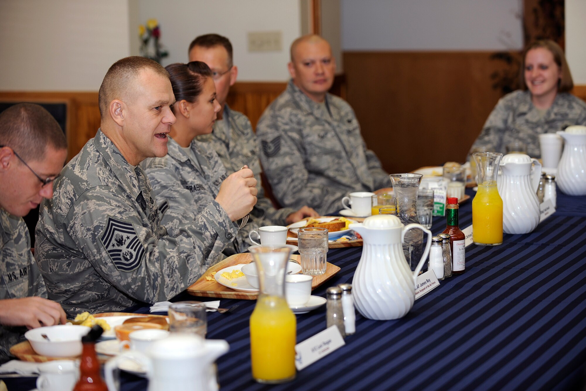 Chief Master Sgt. of the Air Force James Roy (second from left) has breakfast with Peterson Airmen Aug. 26 at the Aragon dining facility. He discussed key focus areas such as training, base development and the Year of the Air Force Family in his first Peterson visit since his appointment as the Air Force’s senior-ranking enlisted member in June. (Air Force photo by Craig Denton)