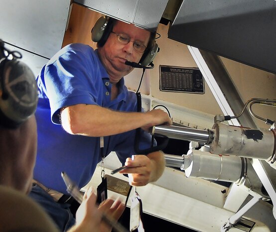 Billy Merritt removes a safety pin from the nose landing gear of a C-17 on the flightline here Aug. 27. Removing the pin allowed a maintenance team to hyraulically raise the gear during an operational checkout. Mr. Merritt is an aircraft maintenance technician with the 437th Aircraft Maintenance Squadron. (U.S. Air Force photo/Staff Sgt. Daniel Bowles)