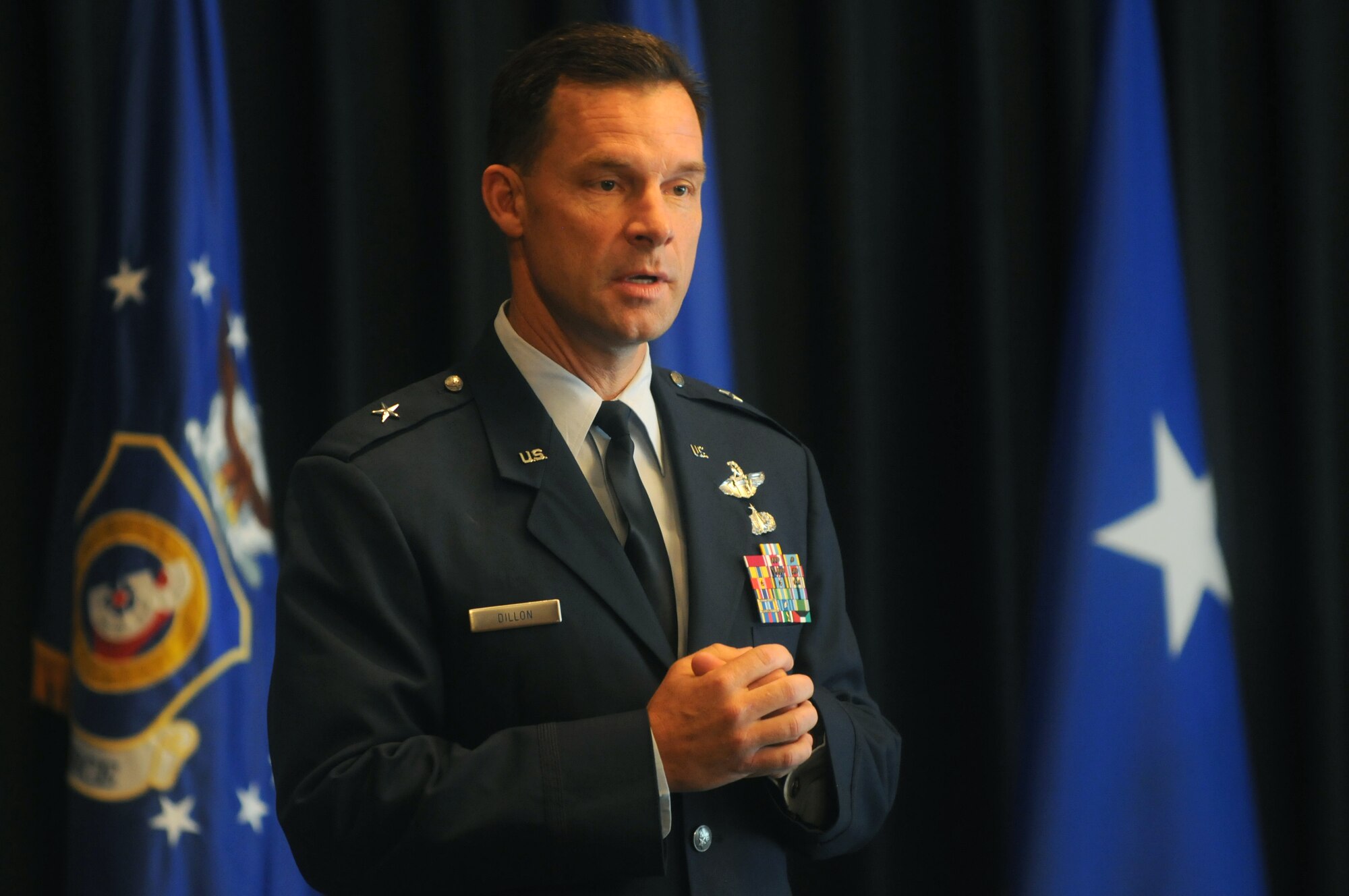 Brig. Gen. Mark Dillon, 86th Airlift Wing commander, speaks at his promotion ceremony at the Officer's Club on Ramstein Air Base, Germany, Sept. 2. Lt. Gen. Frank Gorenc, 3rd Air Force commander, presided over the ceremony. (U.S. Air Force photo by Staff Sgt. Charity Barrett)